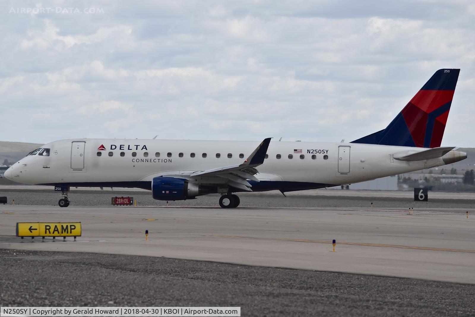N250SY, 2016 Embraer 175LR (ERJ-170-200LR) C/N 17000610, Taxiing onto Alpha for the gate.