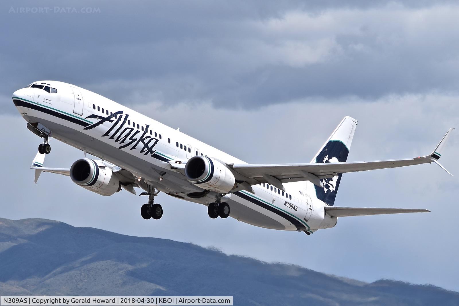 N309AS, 2001 Boeing 737-990 C/N 30857, Take off from RWY 28L.
