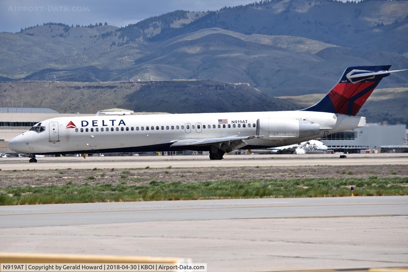 N919AT, 2001 Boeing 717-200 C/N 55084, Turning off RWY 28L onto Golf.