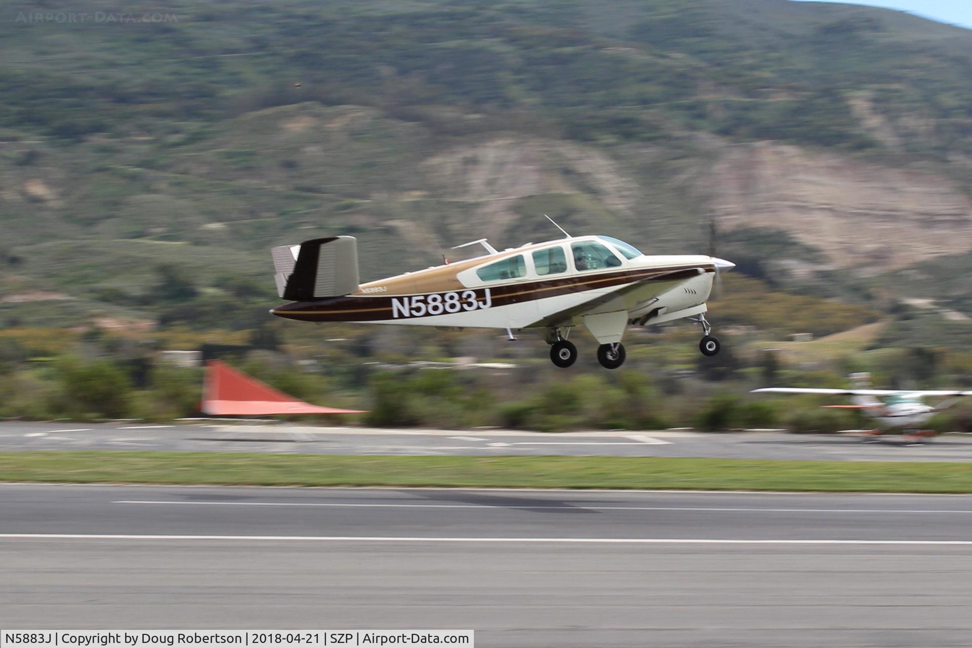 N5883J, 1965 Beech S35 Bonanza C/N D-7874, 1965 Beech S35 BONANZA, Continental IO-520-B 285 Hp, S35 is first 285 Hp BONANZA and stretched for 5/6 seats, takeoff climb Rwy 22.