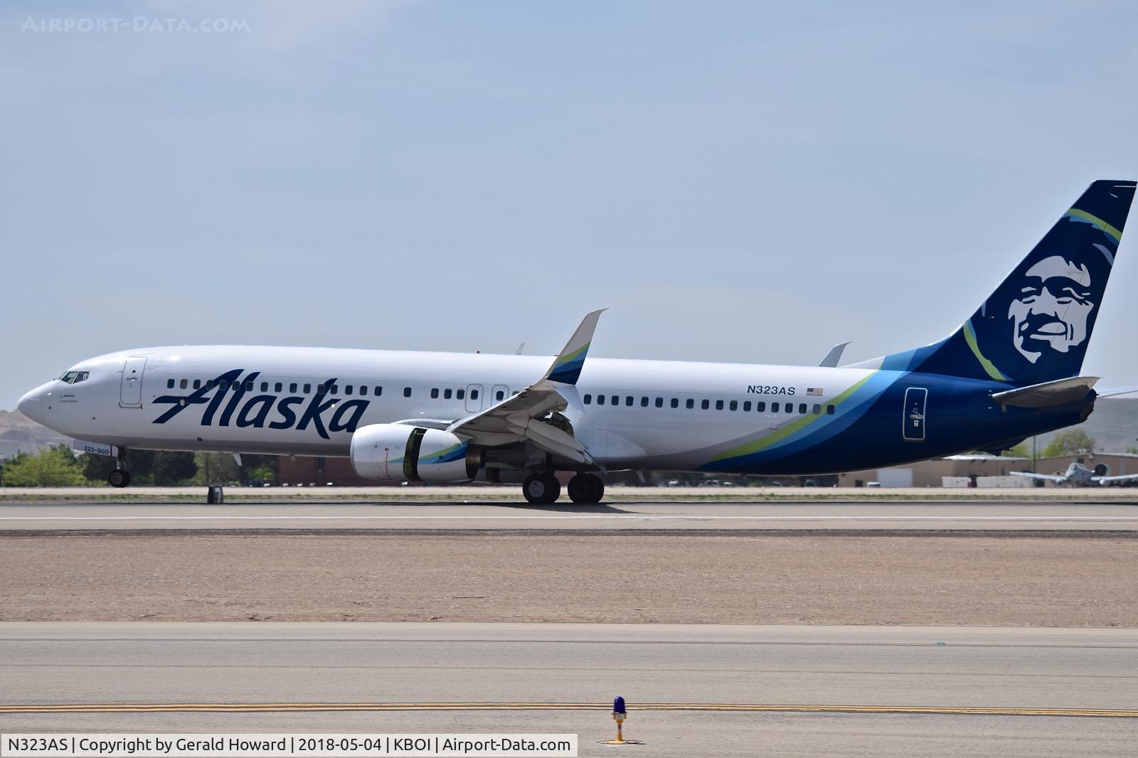 N323AS, 2004 Boeing 737-990 C/N 30021, Landing roll out on RWY 10L.