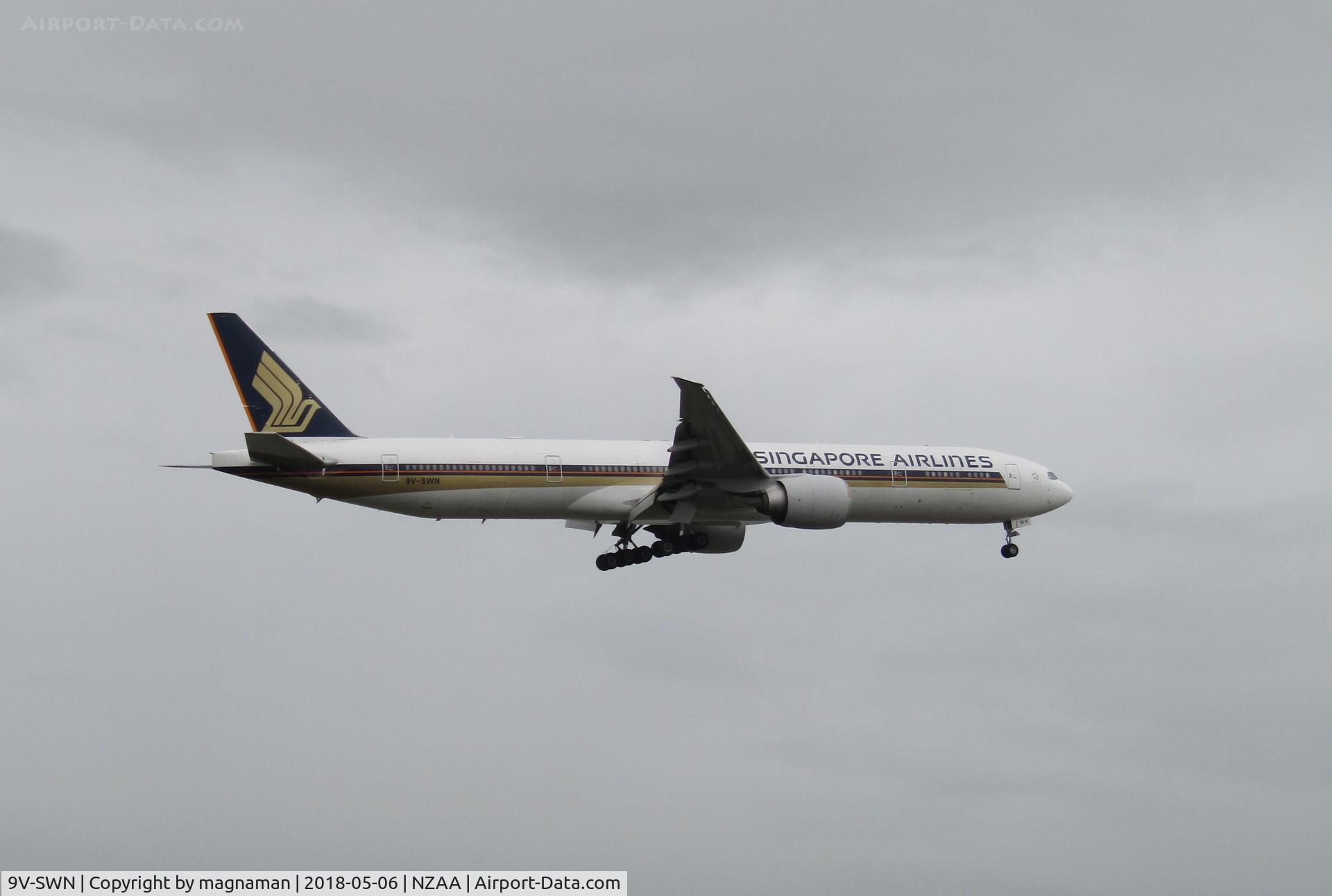 9V-SWN, 2008 Boeing 777-312/ER C/N 34579, FROM PUHINUI ROAD CAR PARK
