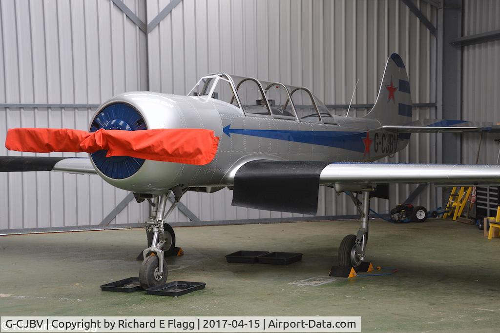 G-CJBV, 1986 Bacau Yak-52 C/N 867203, Hangared at Tibenham