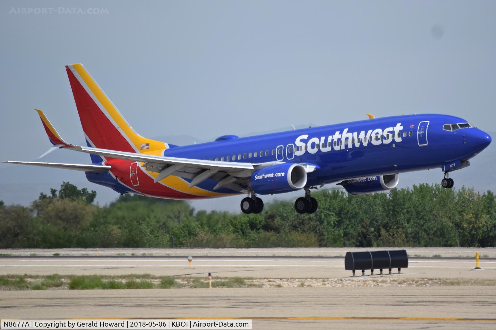 N8677A, 2016 Boeing 737-8H4 C/N 36650, Landing RWY 10L.