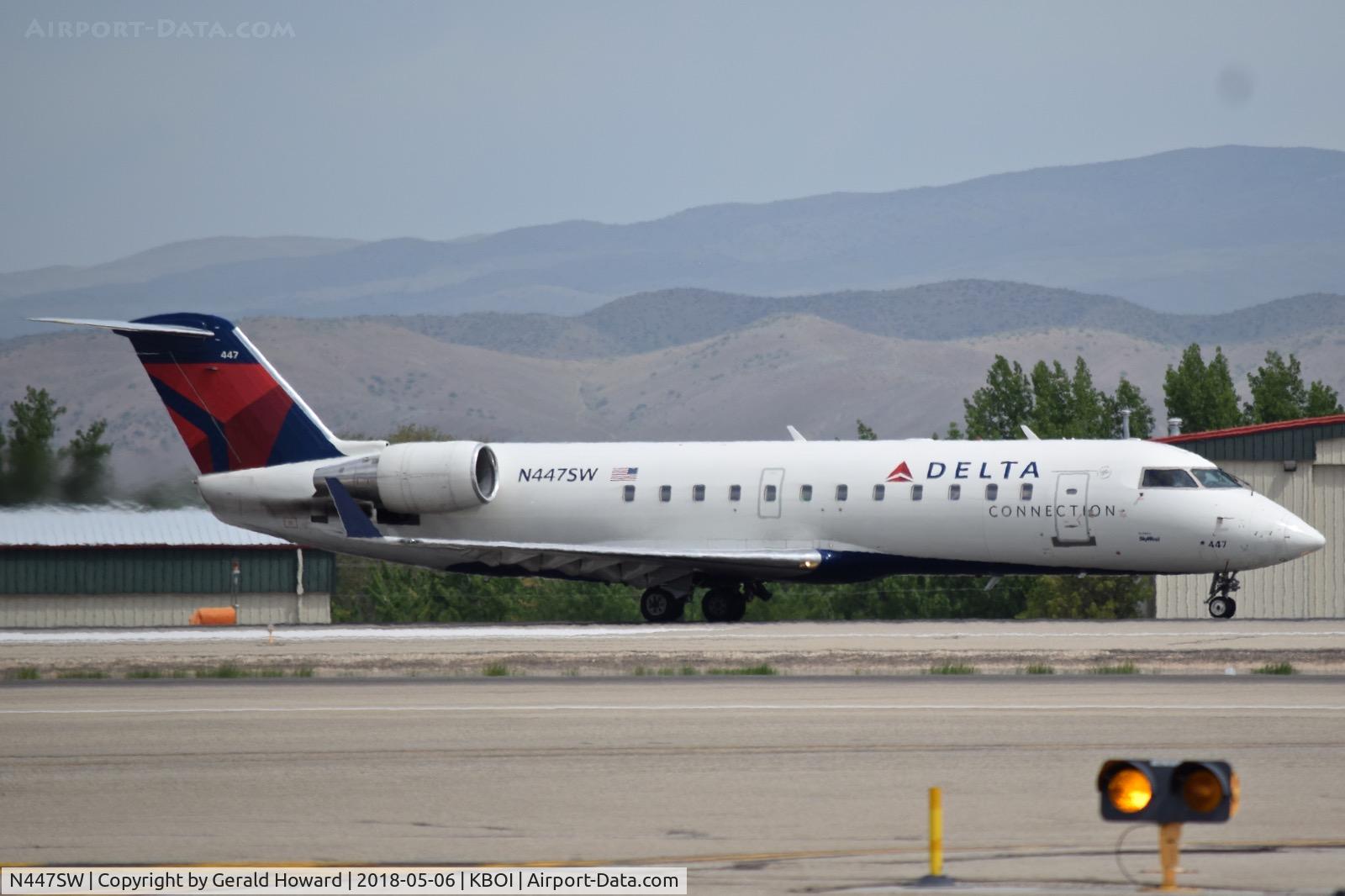 N447SW, 2002 Bombardier CRJ-200LR (CL-600-2B19) C/N 7677, Take off run on RWY 10L.