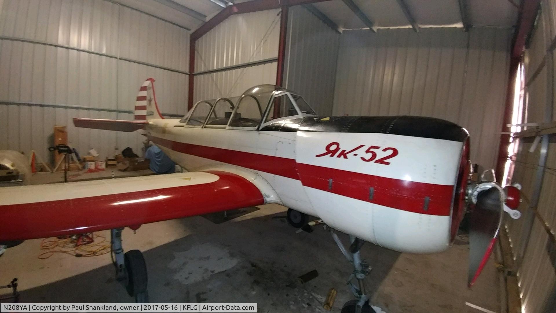 N208YA, 1989 Yakovlev Yak-52 C/N 8910009, In Hangar, KFLG, by owner