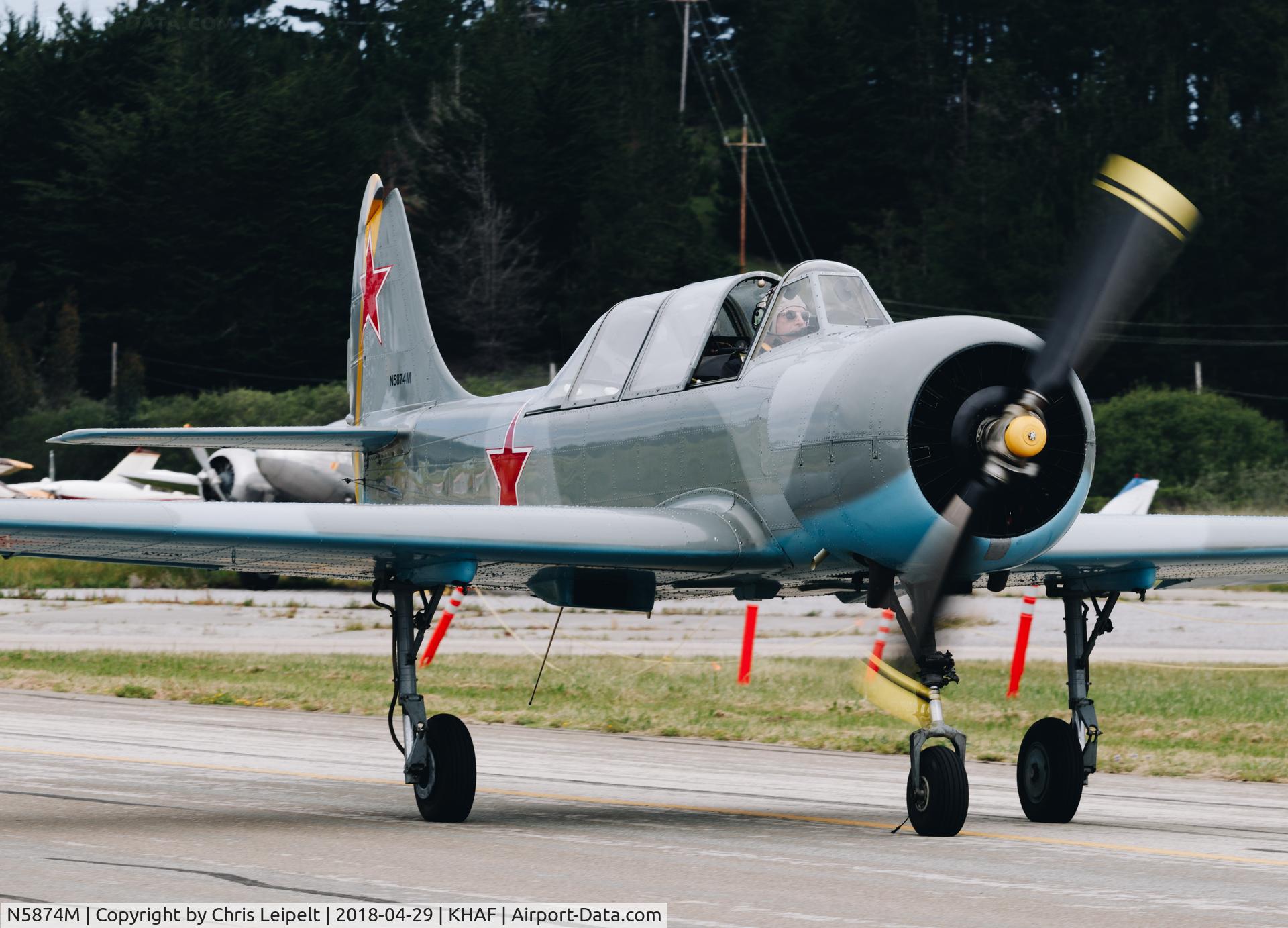 N5874M, 1982 Yakovlev Yak-52 C/N 822302, Locally-based 1982 Yak 52 taxing in at Half Moon Bay Airport Day 2018.