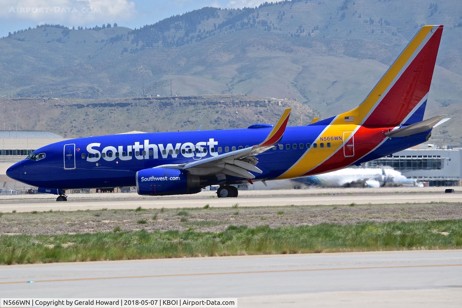 N566WN, 2002 Boeing 737-7CT C/N 32753, Turning onto Golf from RWY 28L.