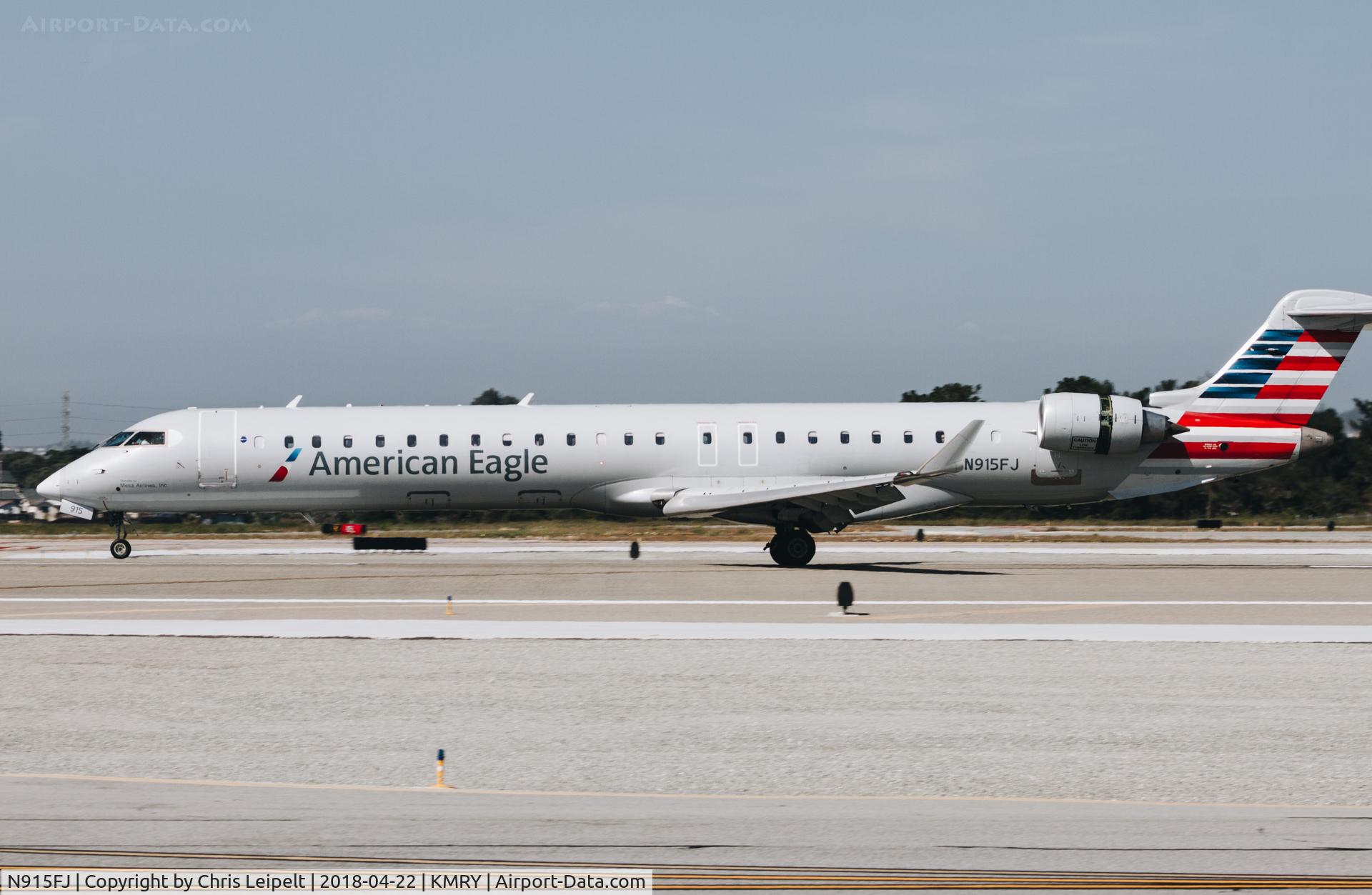 N915FJ, 2004 Bombardier CRJ900 (CL-600-2D24) C/N 15015, 2004 American Eagle CRJ-900 landing at Monterey Regional Airport.