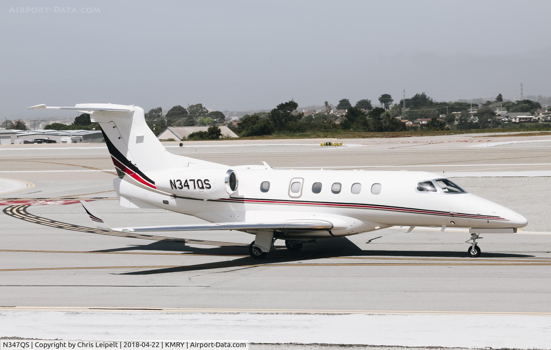 N347QS, 2014 Embraer EMB-505 Phenom 300 C/N 50500257, Net Jets Phenom 300 taxing out for departure at Monterey Regional Airport. Not a Citation Ultra.