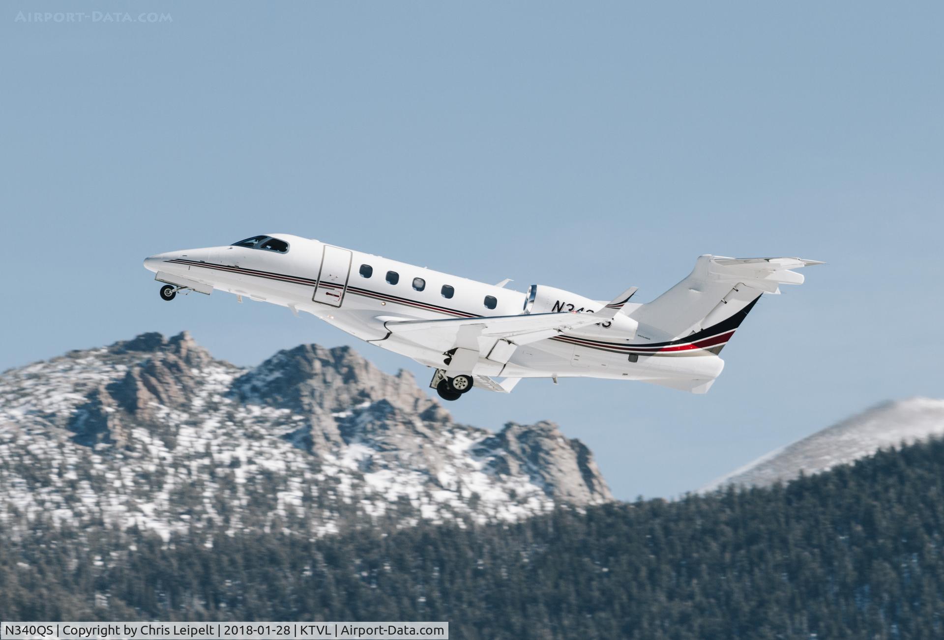 N340QS, 2014 Embraer EMB-505 Phenom 300 C/N 50500189, NetJets 2014 Embraer Phenom 300 departing at South Lake Tahoe Airport, CA.