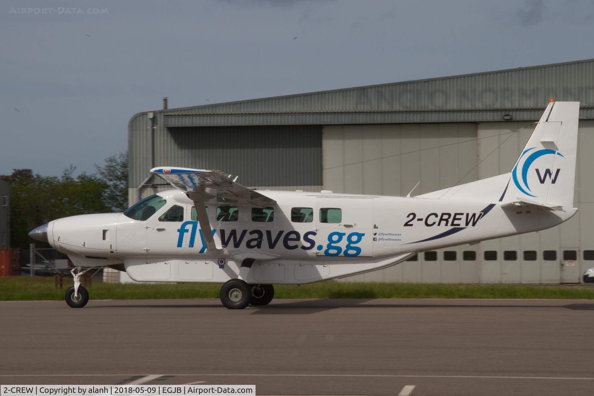 2-CREW, 2009 Cessna 208B Grand Caravan C/N 208B2148, Taxiing on the west apron at Guernsey, Liberation Day, 2018
