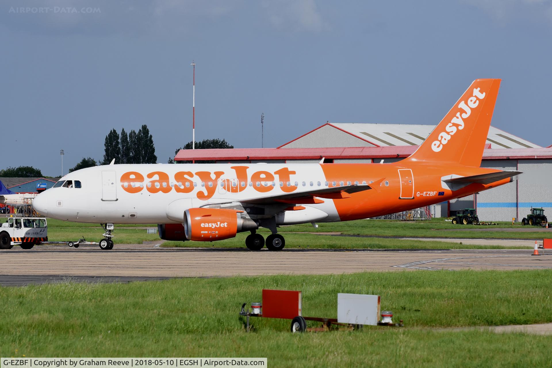 G-EZBF, 2006 Airbus A319-111 C/N 2923, Under tow at Norwich, after a visit to the paint shop.