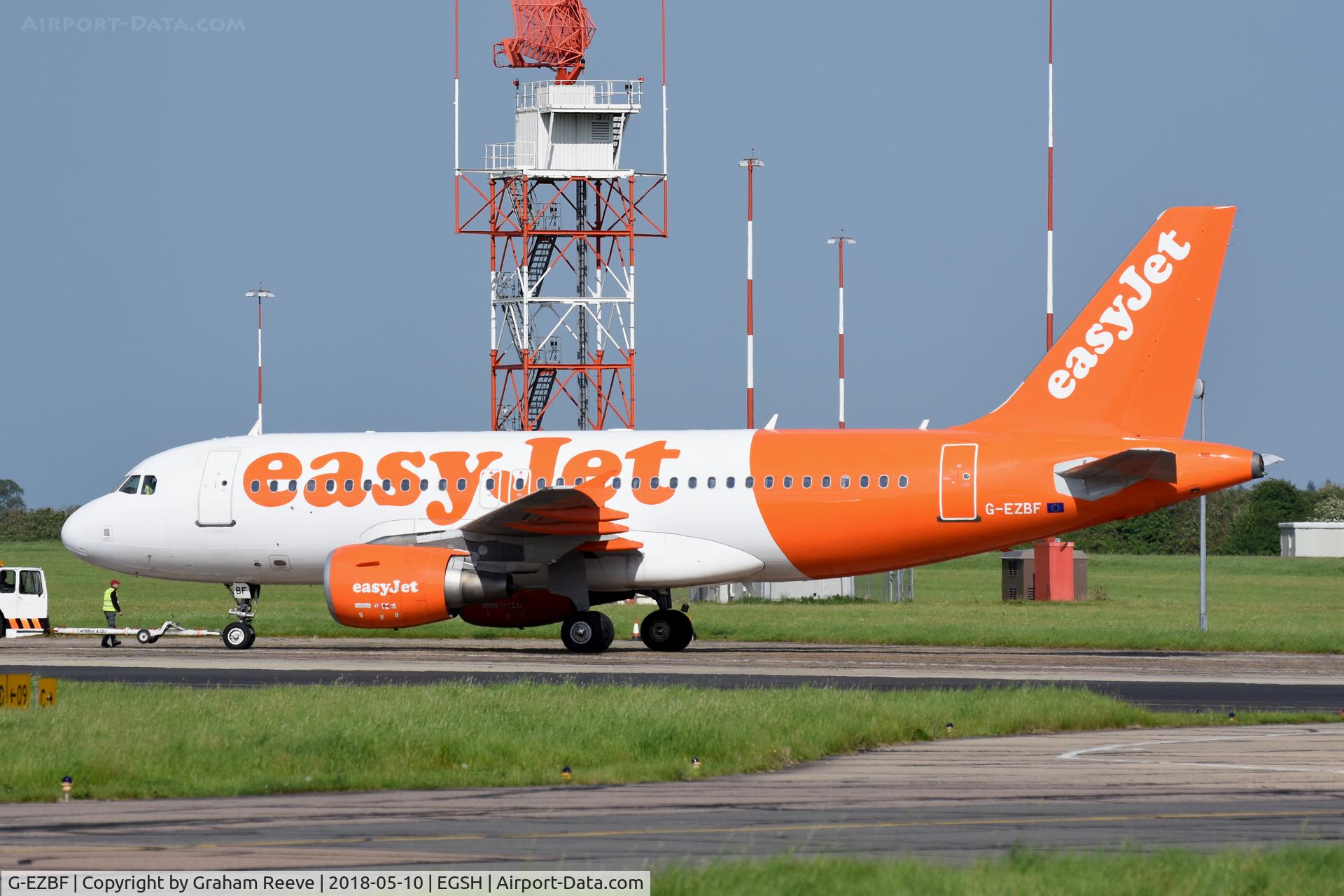 G-EZBF, 2006 Airbus A319-111 C/N 2923, Under tow at Norwich, after a visit to the paint shop.