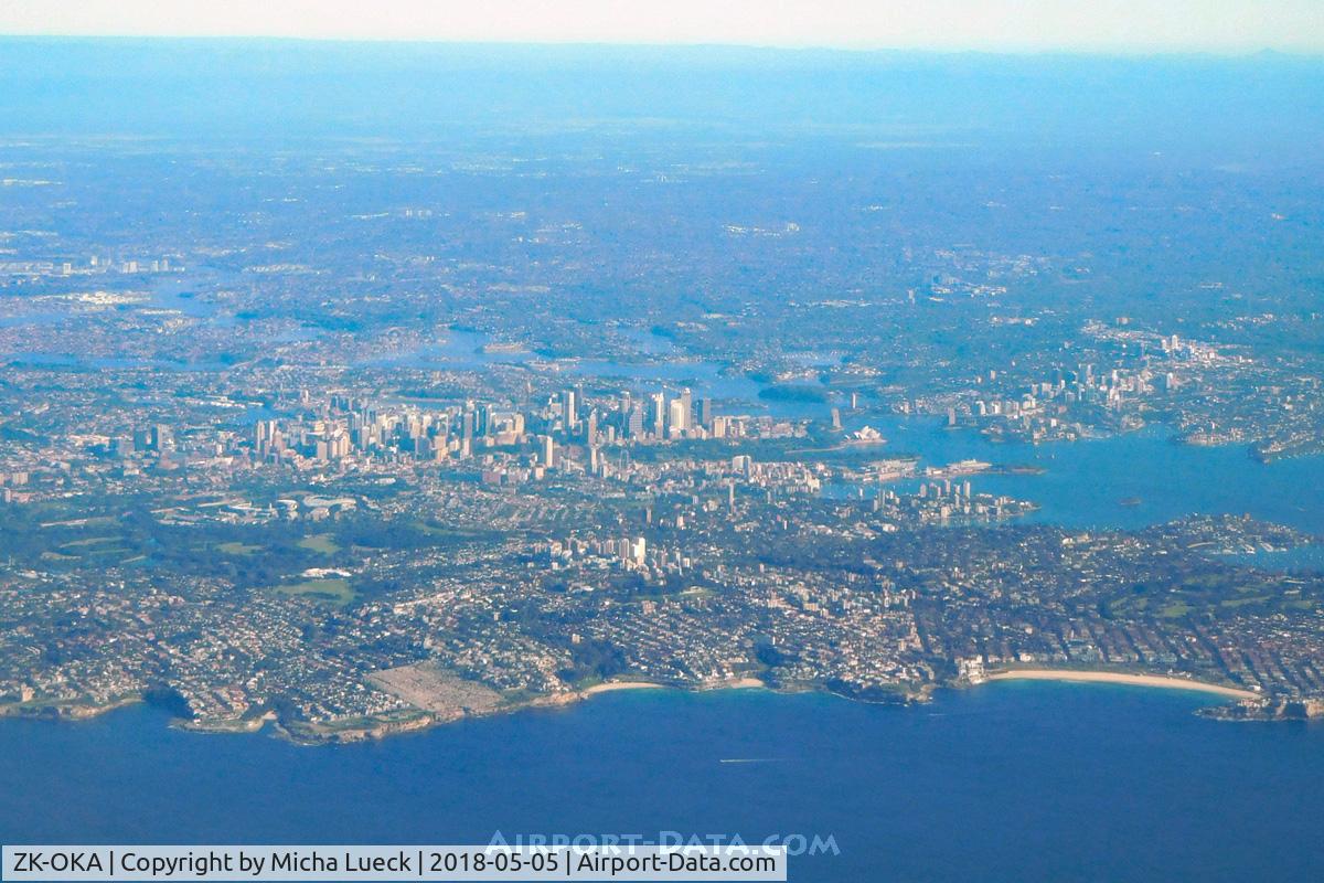 ZK-OKA, 2005 Boeing 777-219/ER C/N 29404, Sydney, incl. Harbour Bridge and Opera House. Taken from ZK-OKA (AKL-SYD)