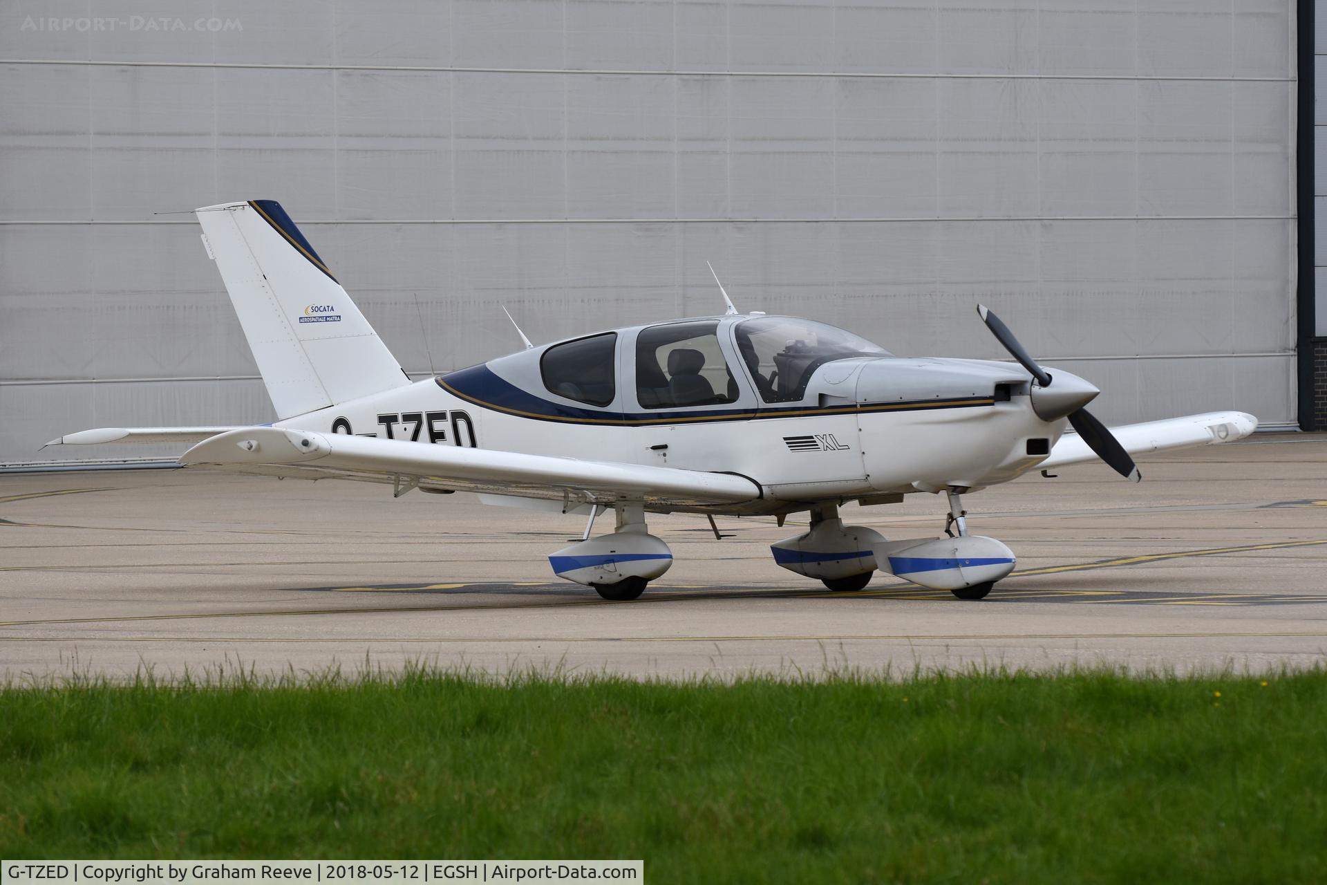 G-TZED, 1997 Socata TB-200 Tobago XL C/N 1813, Parked at Norwich.