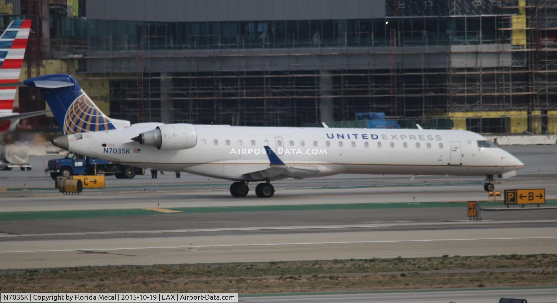 N703SK, 2004 Bombardier CRJ-701ER (CL-600-2C10) Regional Jet C/N 10139, United Express