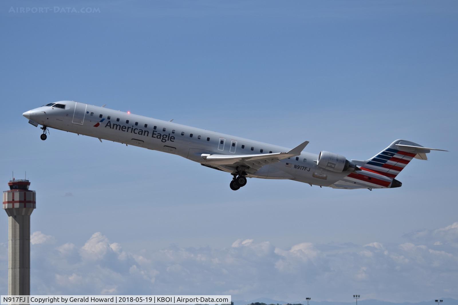 N917FJ, 2004 Bombardier CRJ-900ER (CL-600-2D24) C/N 15017, Departing RWY 10L.
