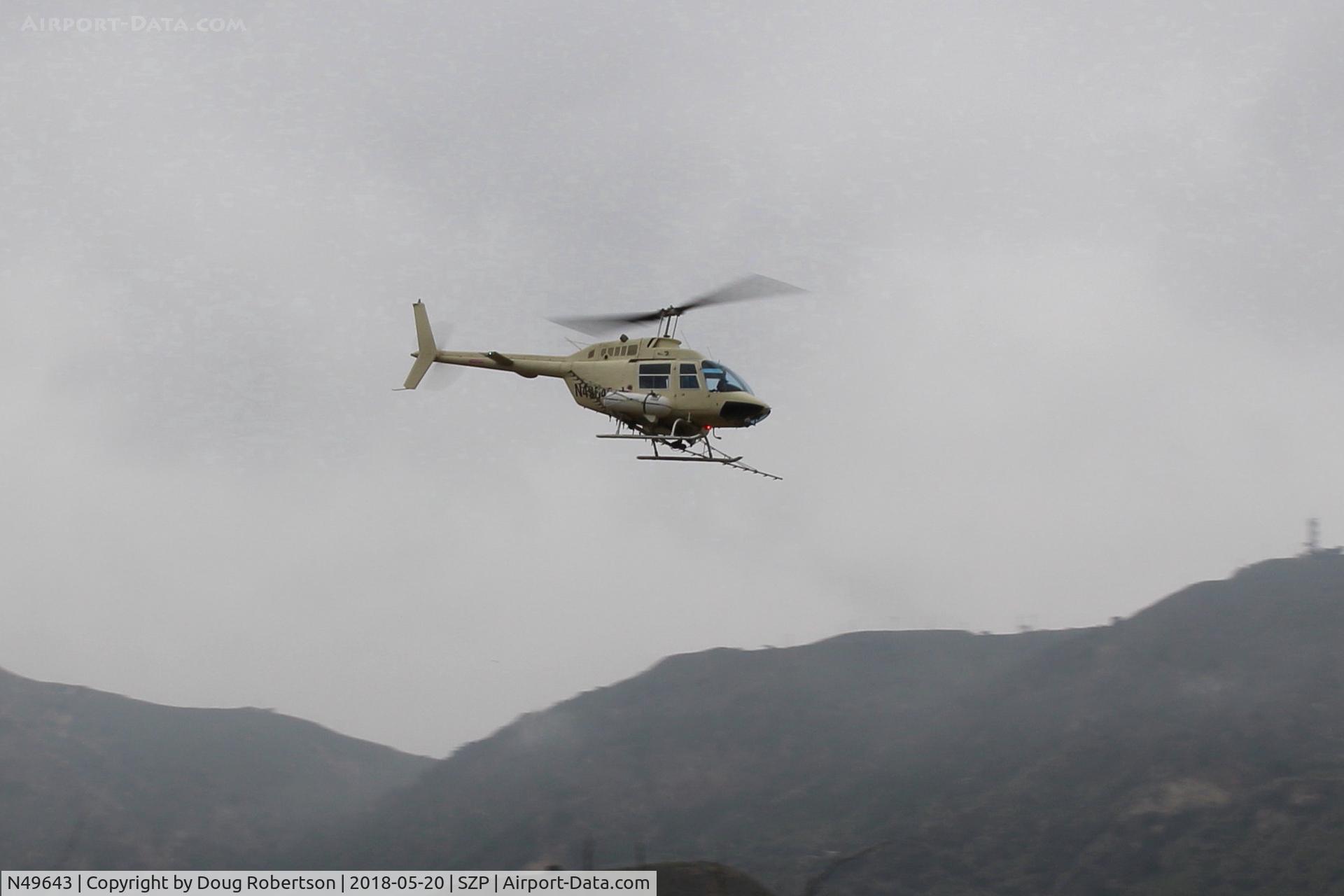 N49643, 1975 Bell 206B JetRanger C/N 1813, 1975 Bell 206B JetRanger, one Allison 250-C20 Turboshaft, 420 SHp for 5 min. 370 SHp continuous, Extra fuel mod by STC, returning from aerial applicator spray job to Aspen at KOXR over Santa Clara River route.
