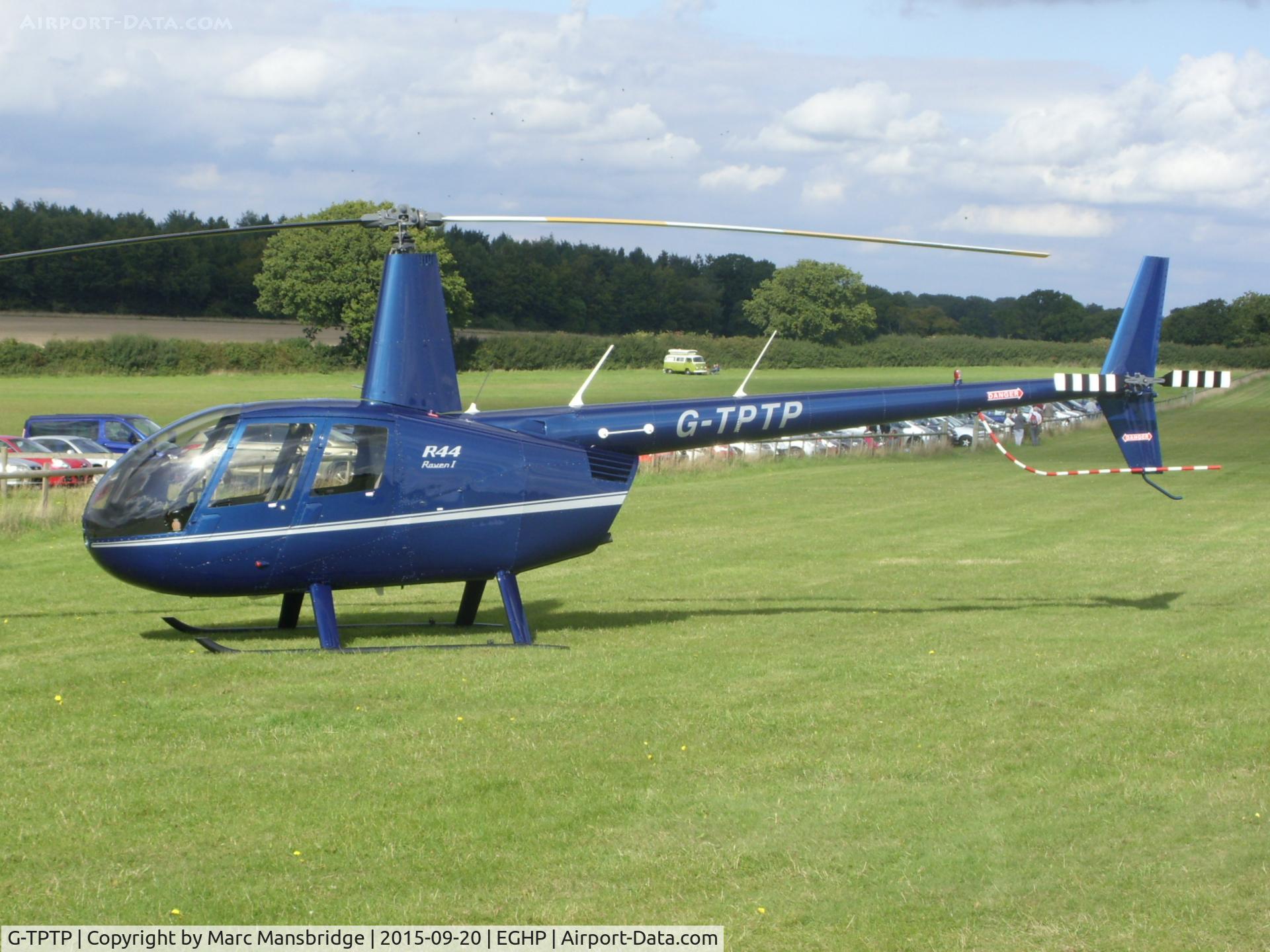 G-TPTP, 2010 Robinson R44 Raven C/N 2065, Parked at Popham airfield EGHP