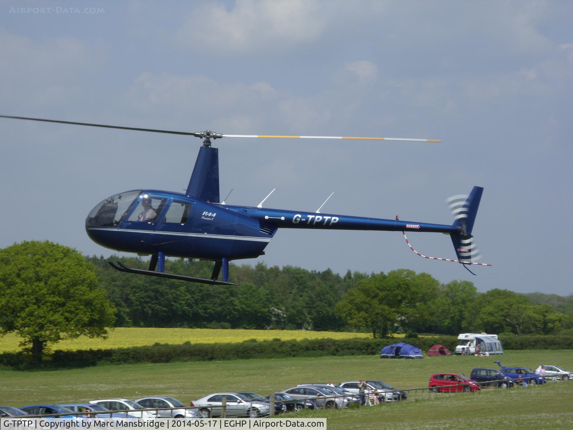 G-TPTP, 2010 Robinson R44 Raven C/N 2065, Landing at Popham airfield EGHP