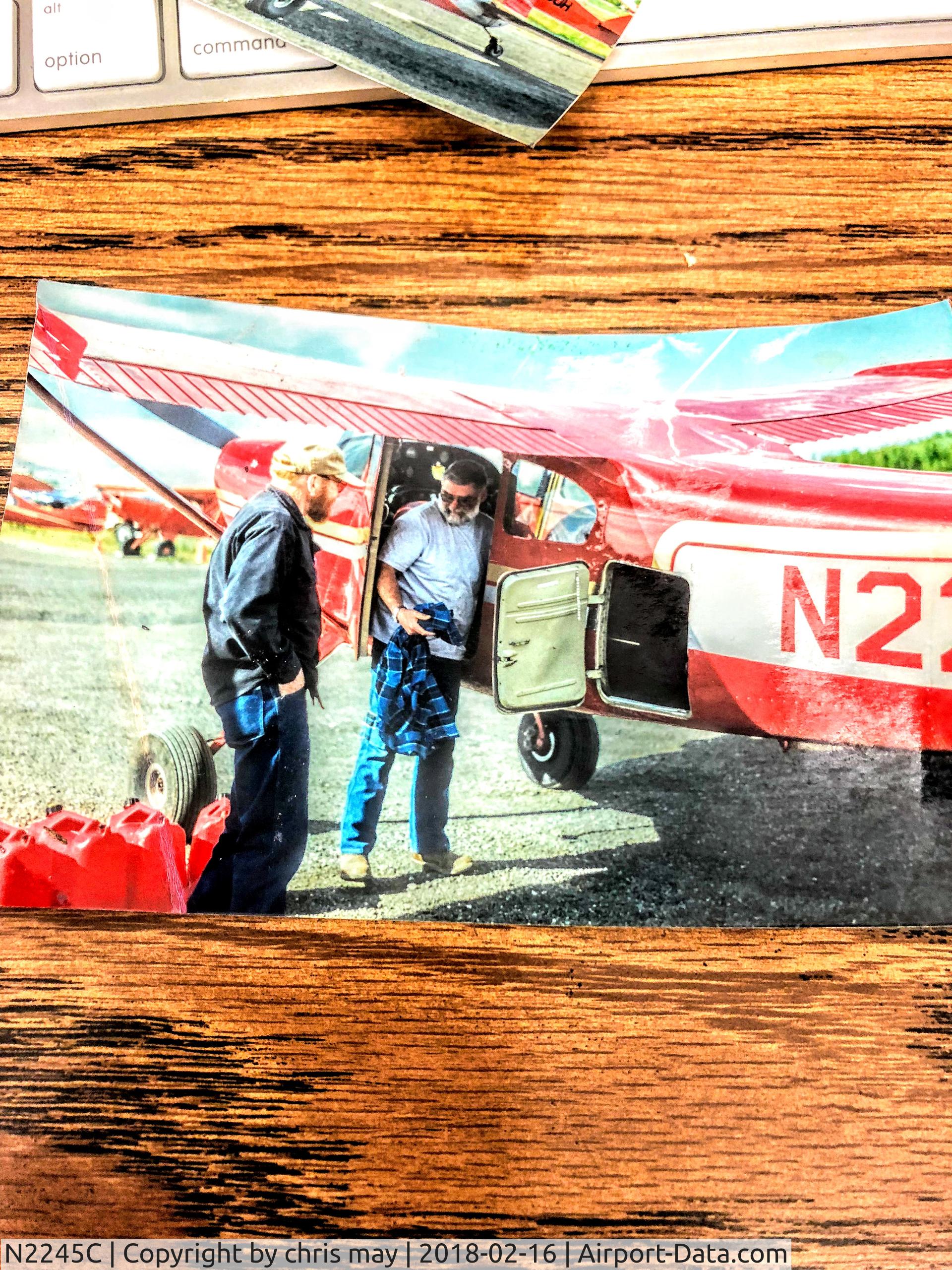 N2245C, 1953 Cessna 180 C/N 30545, loading gass cans before flight