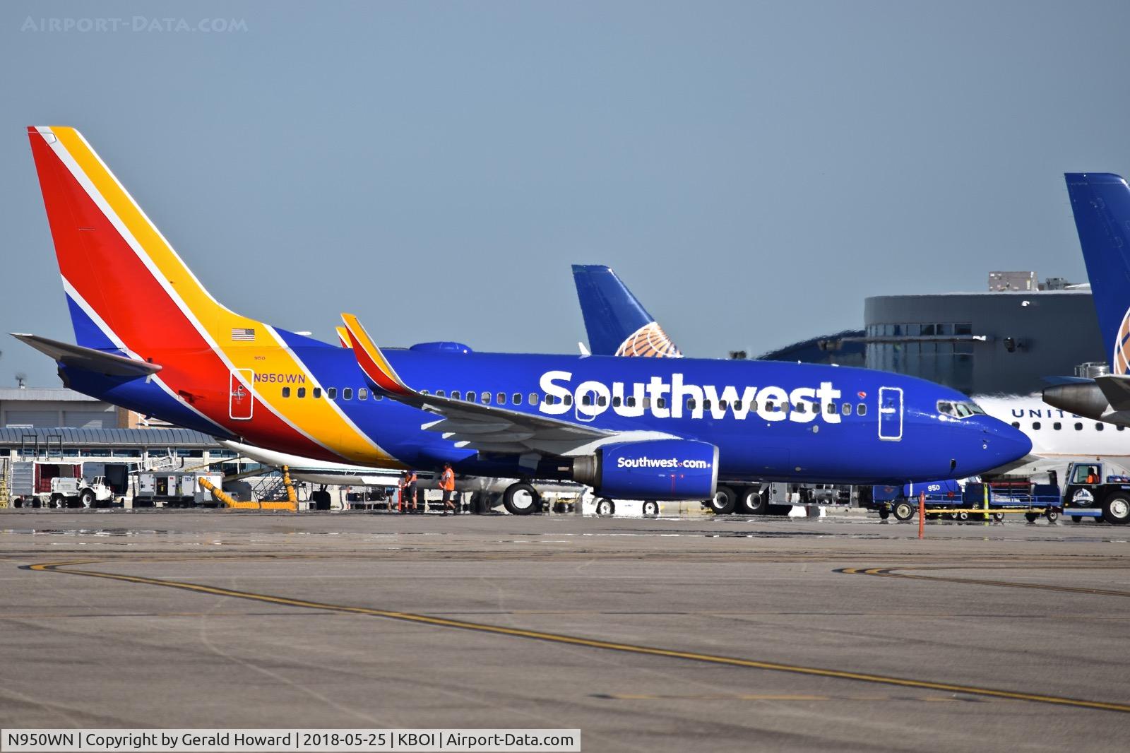 N950WN, 2010 Boeing 737-7H4 C/N 36664, Push back from the gate.