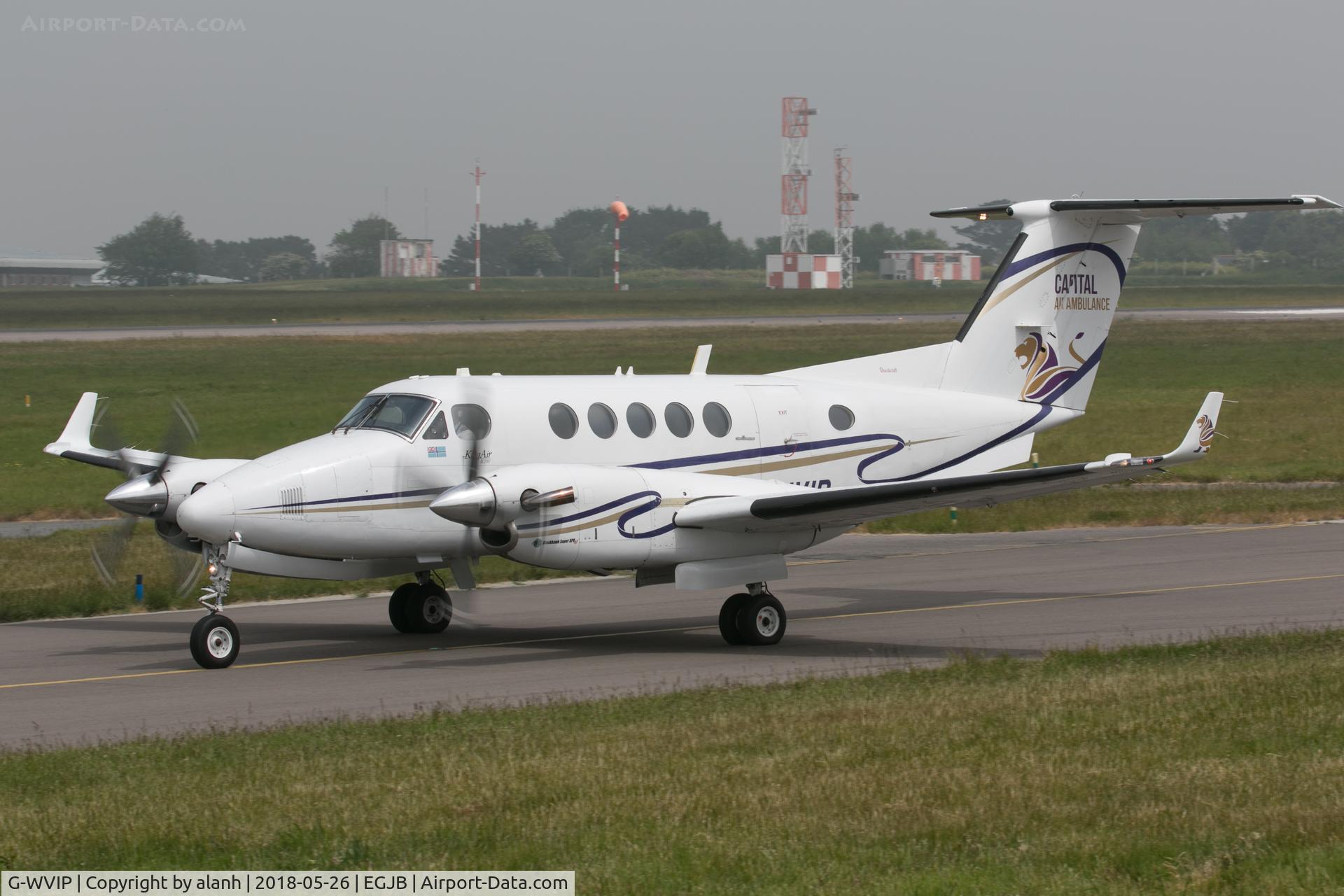 G-WVIP, 1980 Beech 200 Super King Air C/N BB-625, Taxiing for departure at Guernsey; note the Capital Air Ambulance title and logo on the tail