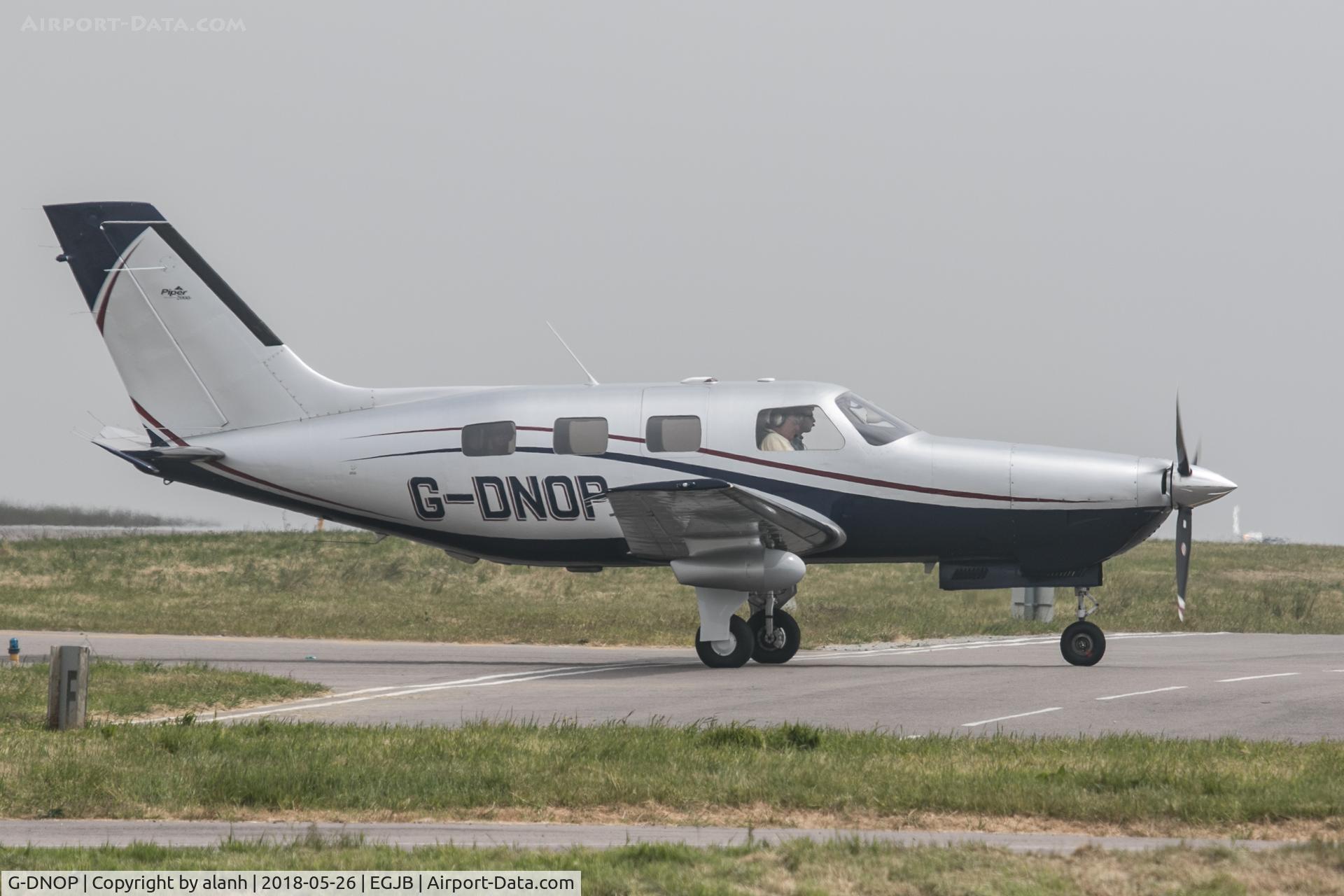G-DNOP, 2000 Piper PA-46-350P Malibu Mirage C/N 4636303, Taxiing to the west parking at Guernsey