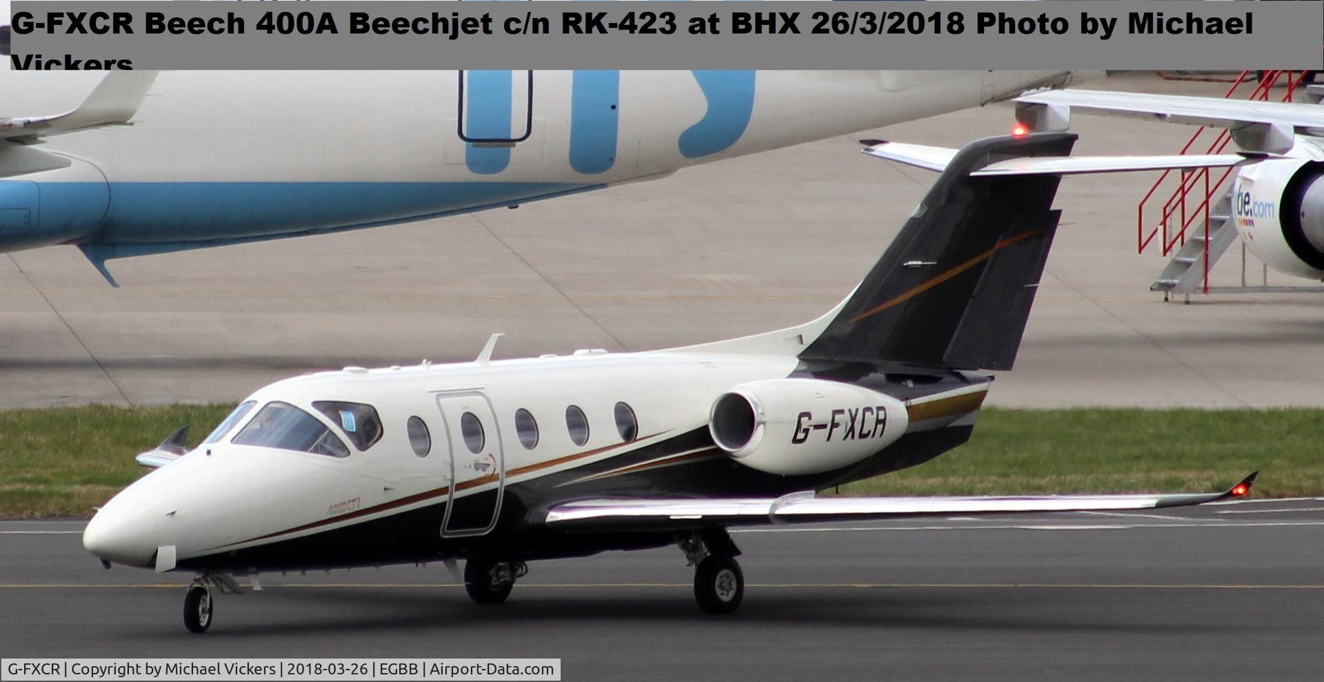 G-FXCR, 2005 Raytheon Beechjet 400A/Nextant N400XT C/N RK-423, Just paring on the XLR apron at BHX