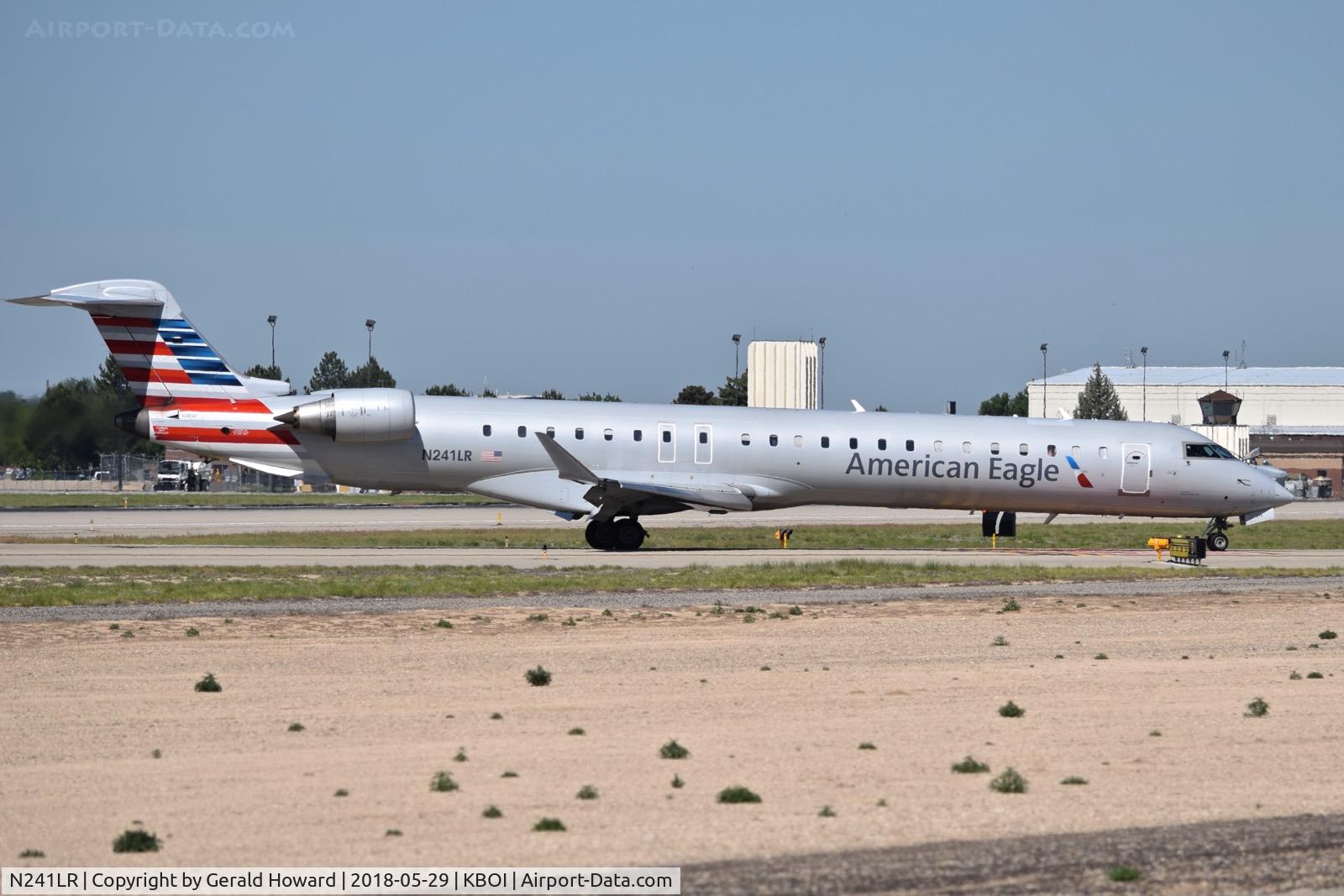 N241LR, 2006 Canadair CRJ-900LR (CL-600-2D24) C/N 15066, Turning off RWY 28L.