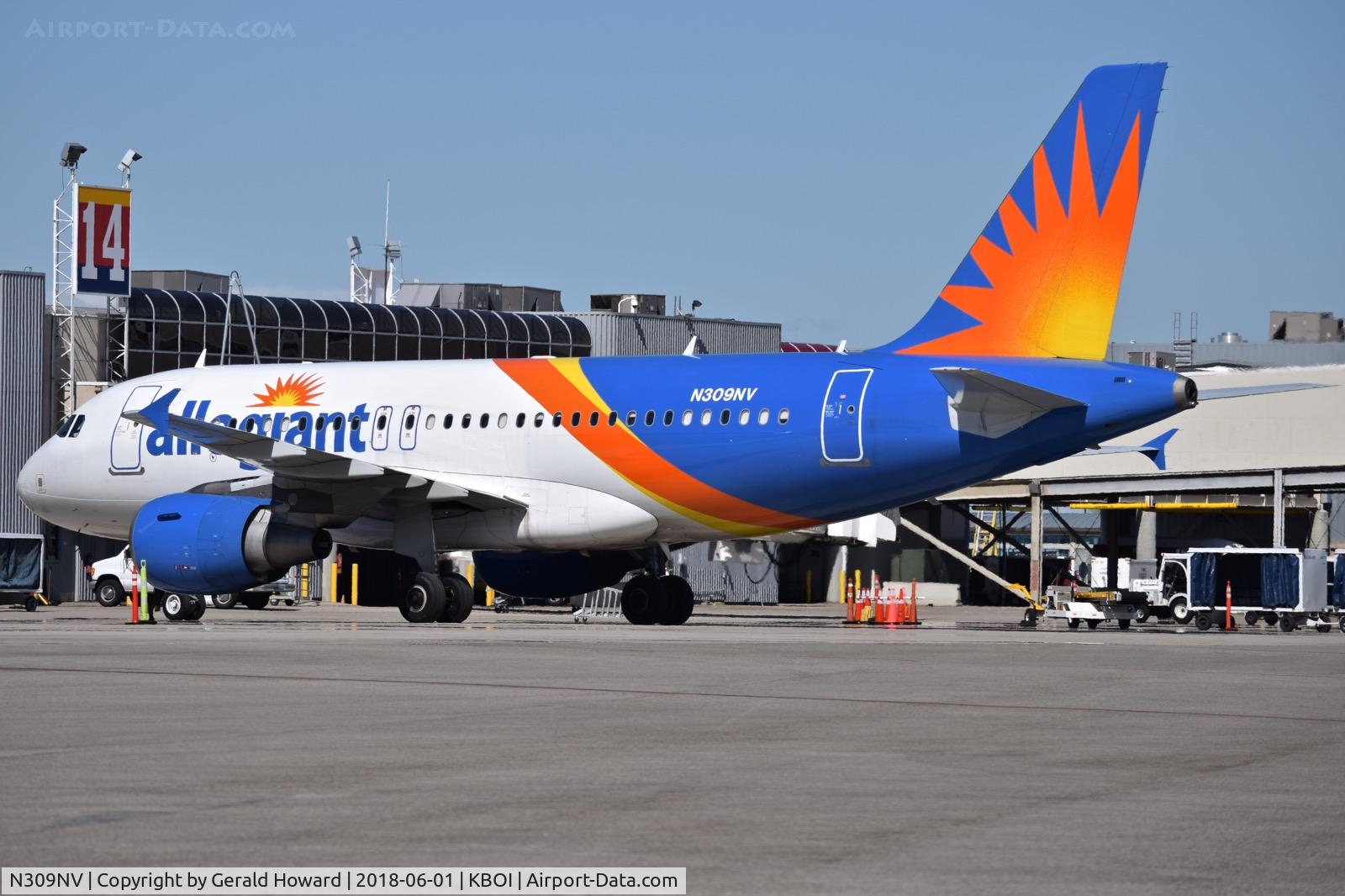N309NV, 2007 Airbus A319-111 C/N 3084, Parked at the gate.