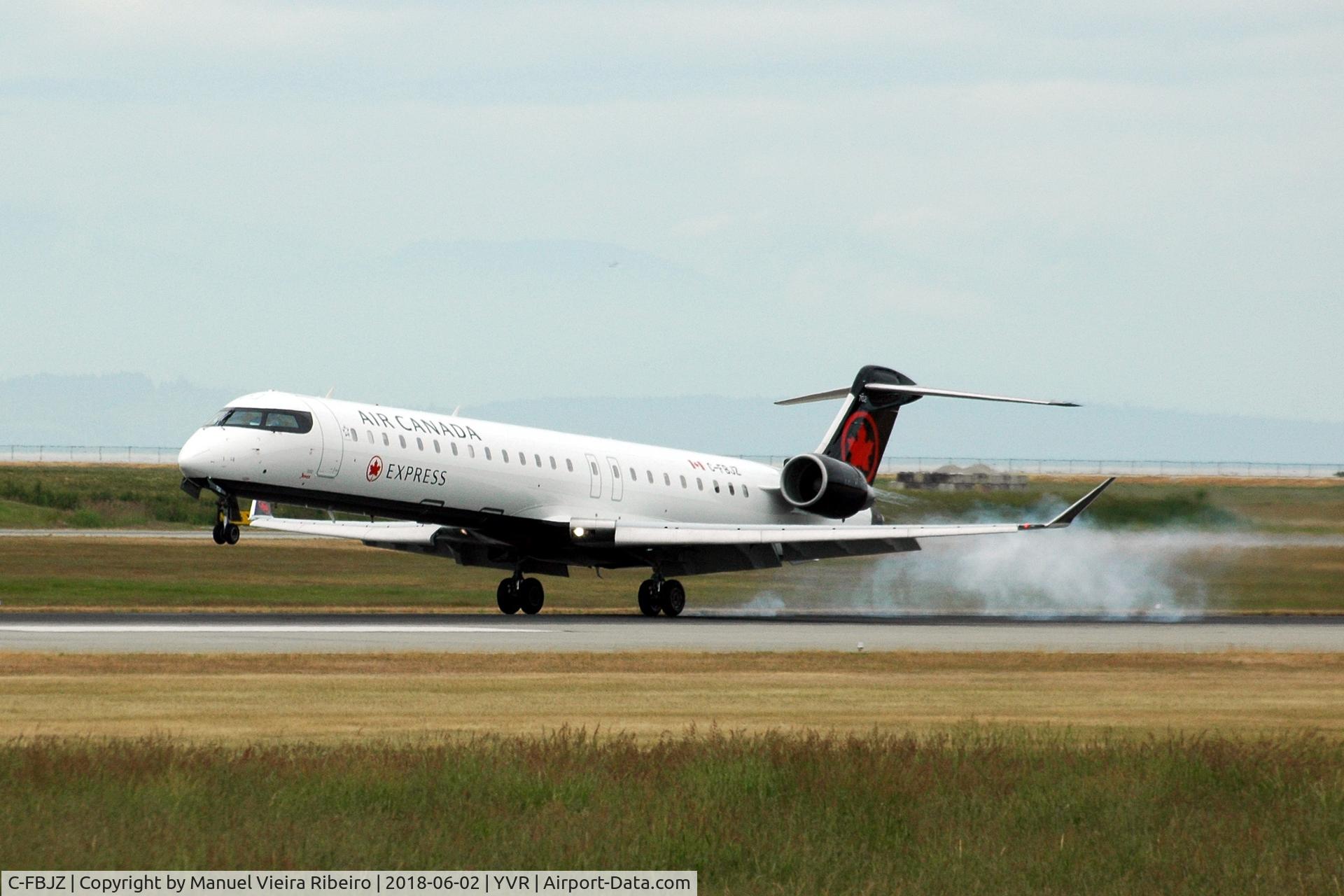 C-FBJZ, 2005 Canadair CRJ-705ER (CL-600-2D15) Regional Jet C/N 15037, Now in the 2017 livery,landing at YVR