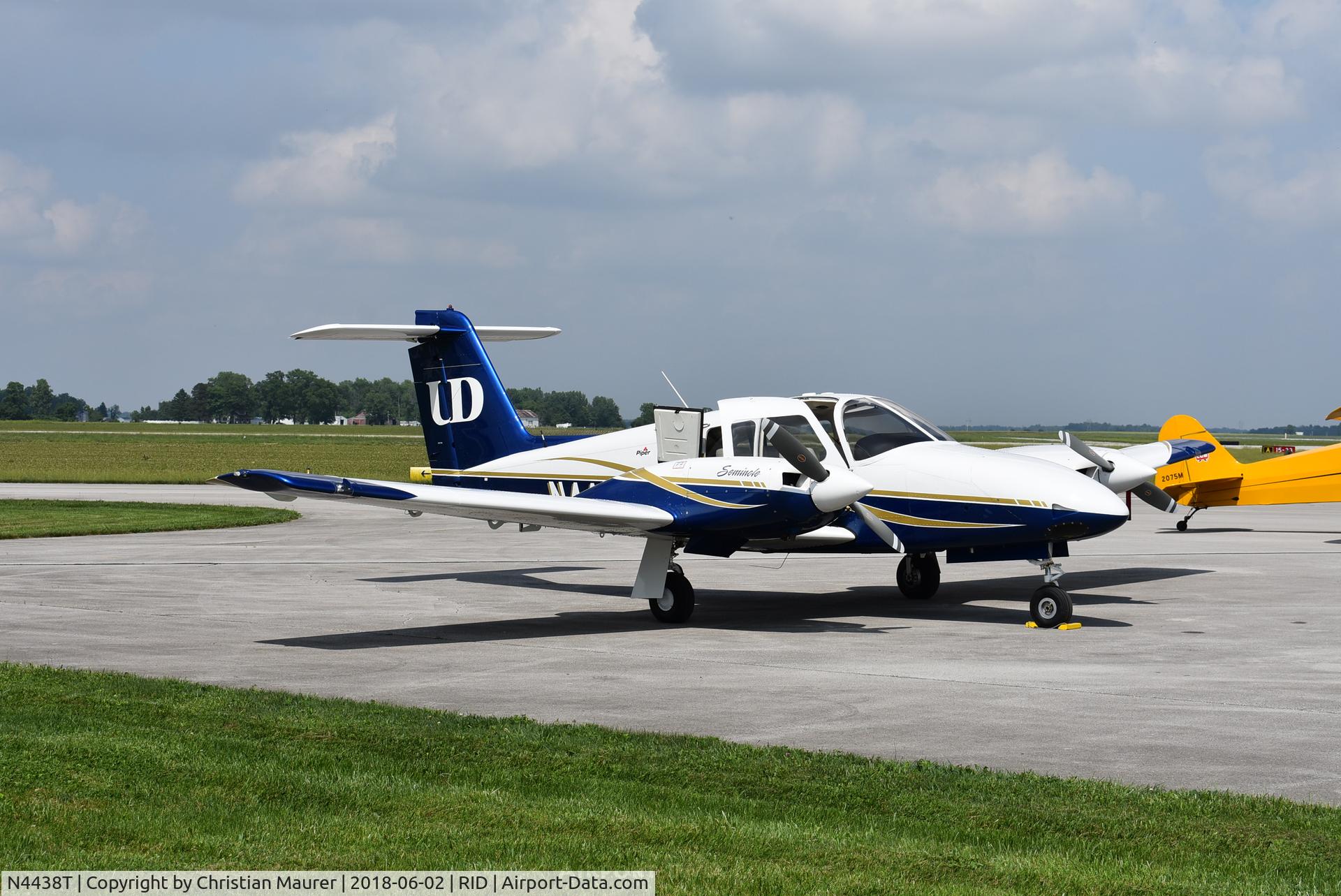 N4438T, 2015 Piper PA-44-180 Seminole C/N 4496388, PA-44-180 Seminole parked on the ramp in Richmond, Indiana sitting to Piper Cub 75M