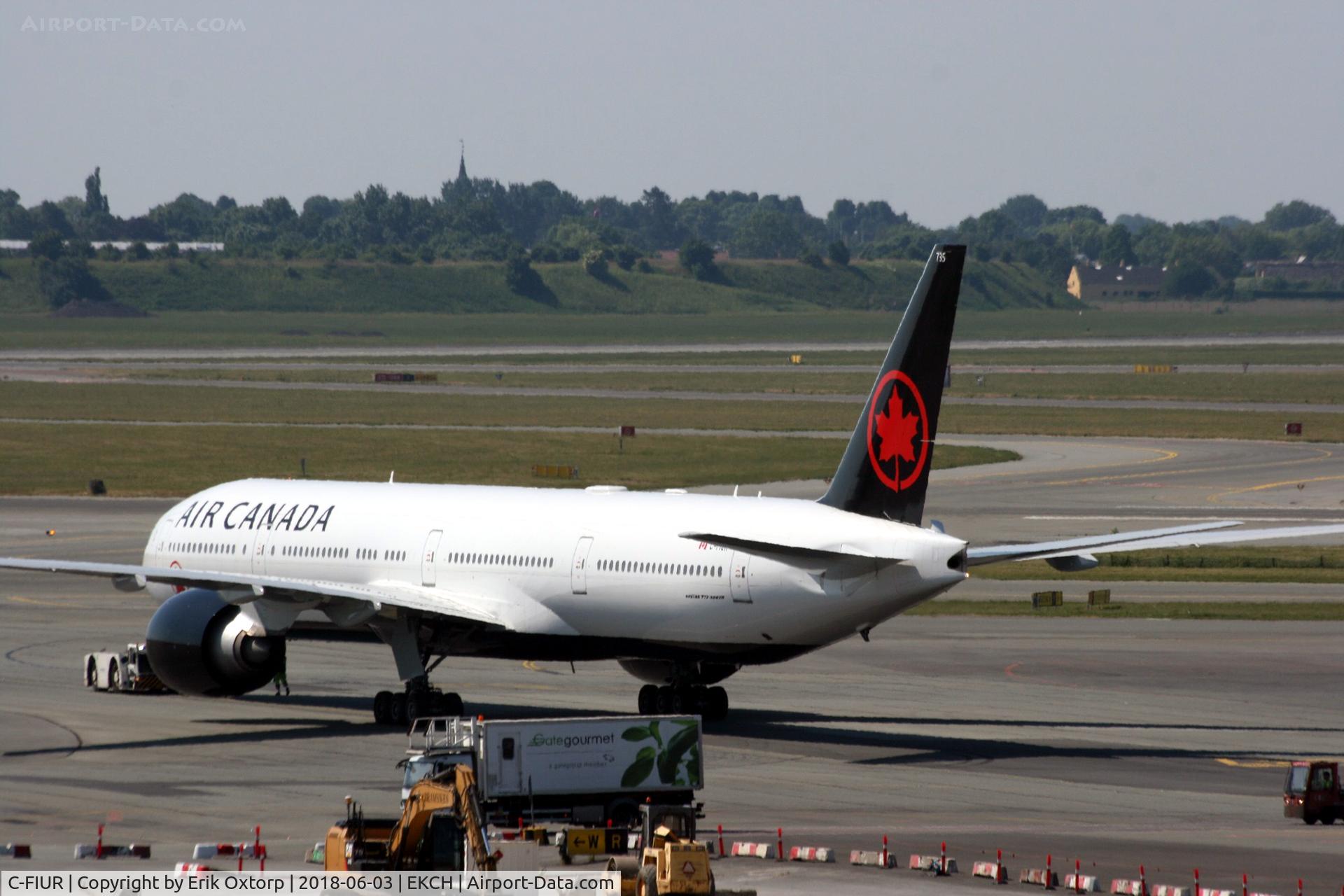 C-FIUR, 2007 Boeing 777-333/ER C/N 35242, C-FIUR pushed back form the gate