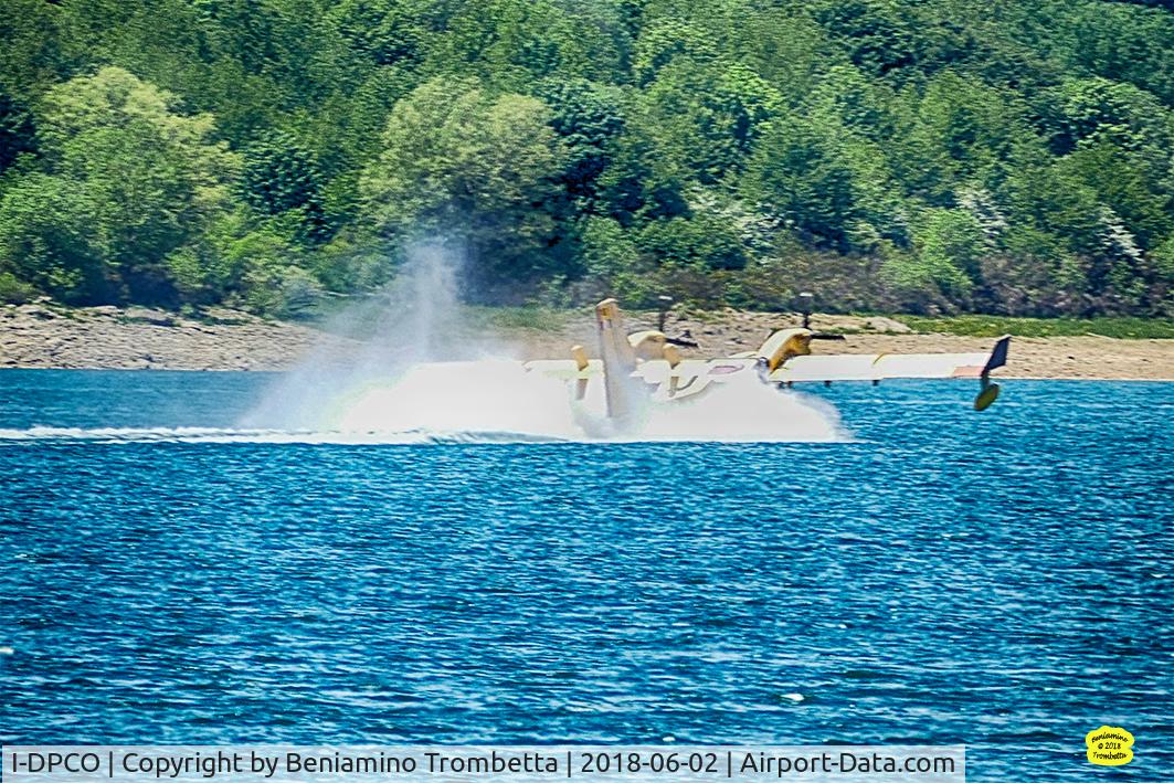 I-DPCO, 2007 Canadair CL-215-6B11 CL-415 C/N 2009, A Canadair, in anti-fire service, fills the water tanks in Campotosto Lake