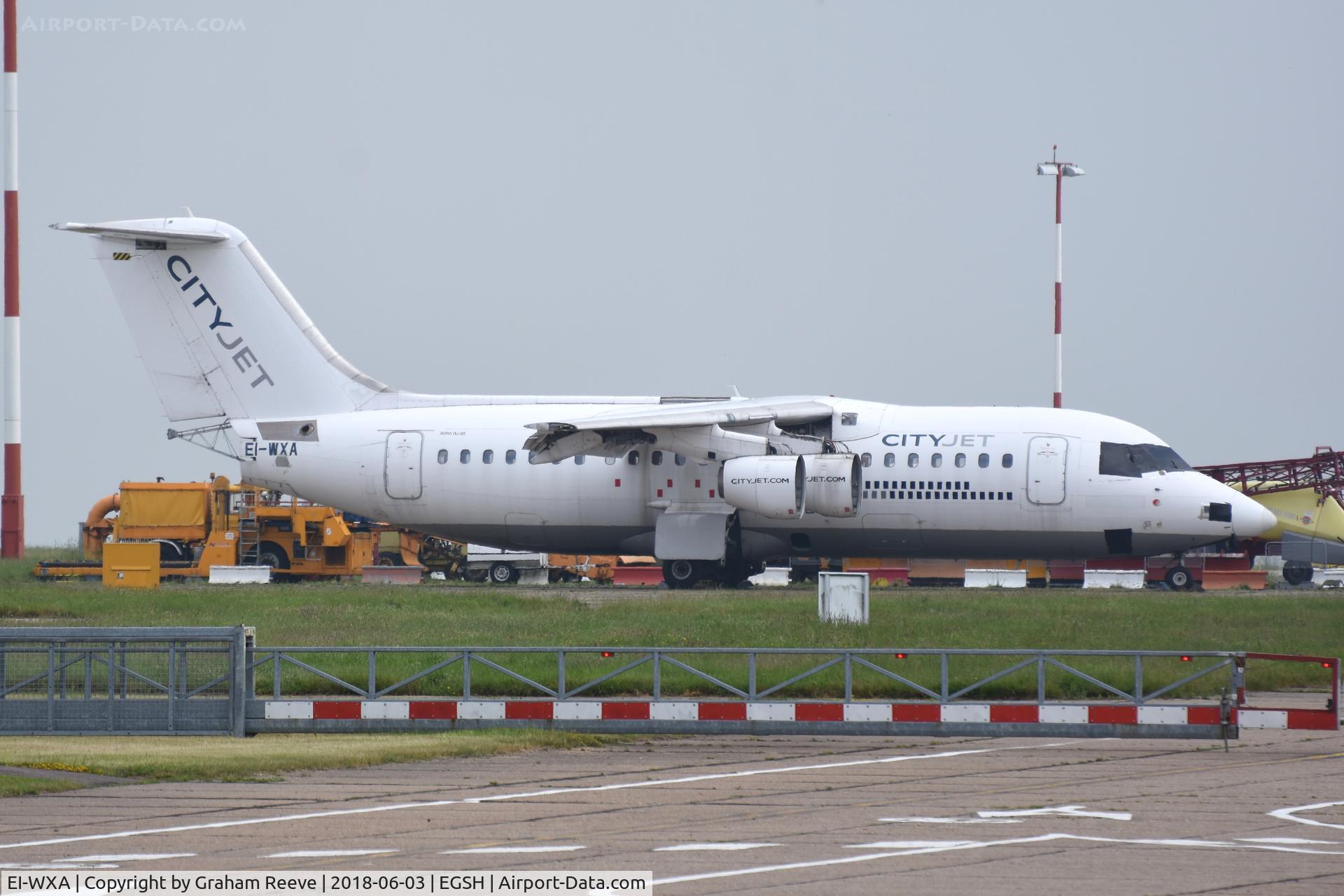 EI-WXA, 1997 British Aerospace Avro 146-RJ85A C/N E2310, With engines and other parts removed.