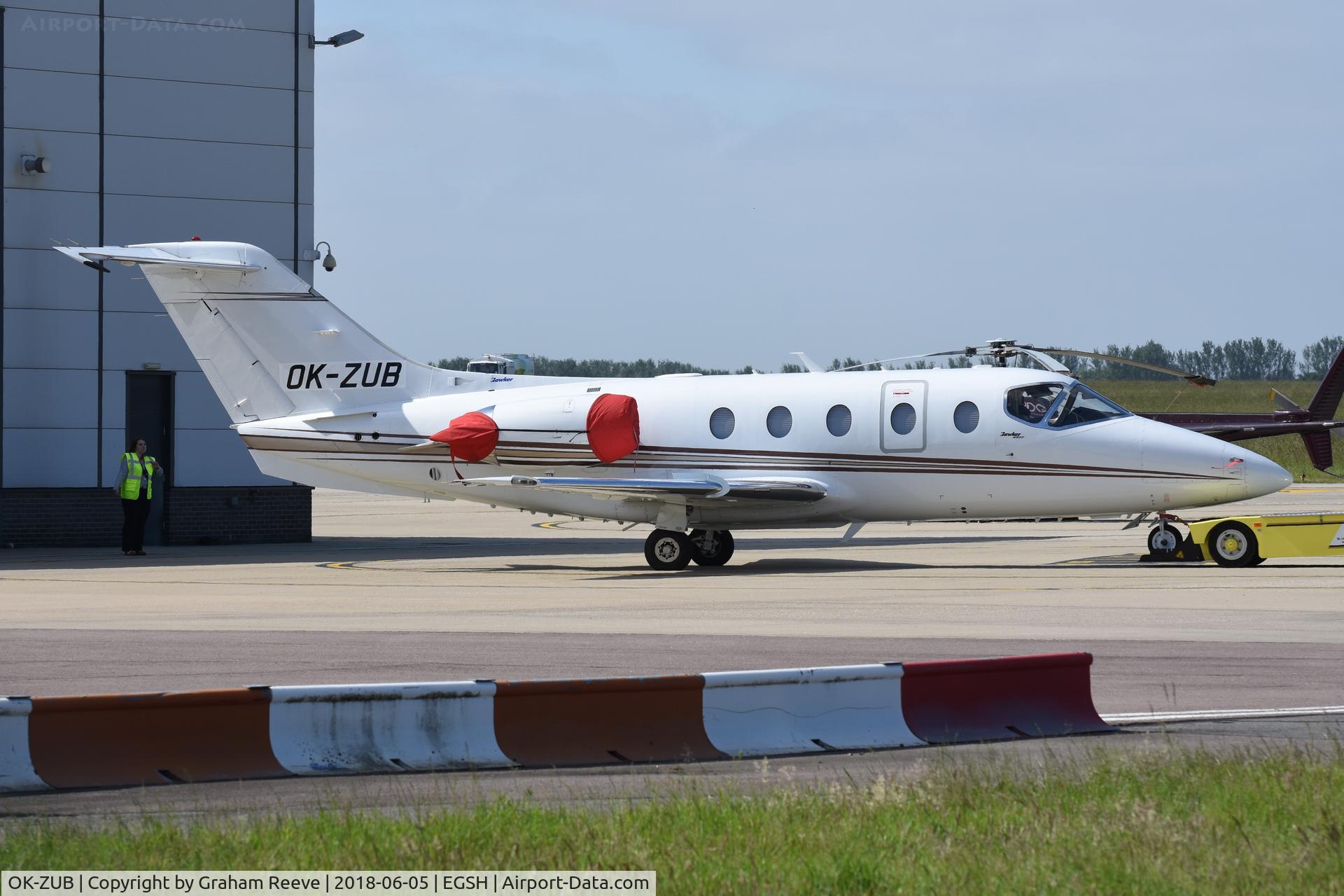 OK-ZUB, 2009 Raytheon Hawker 400XP C/N RK-552, Under tow at Norwich.