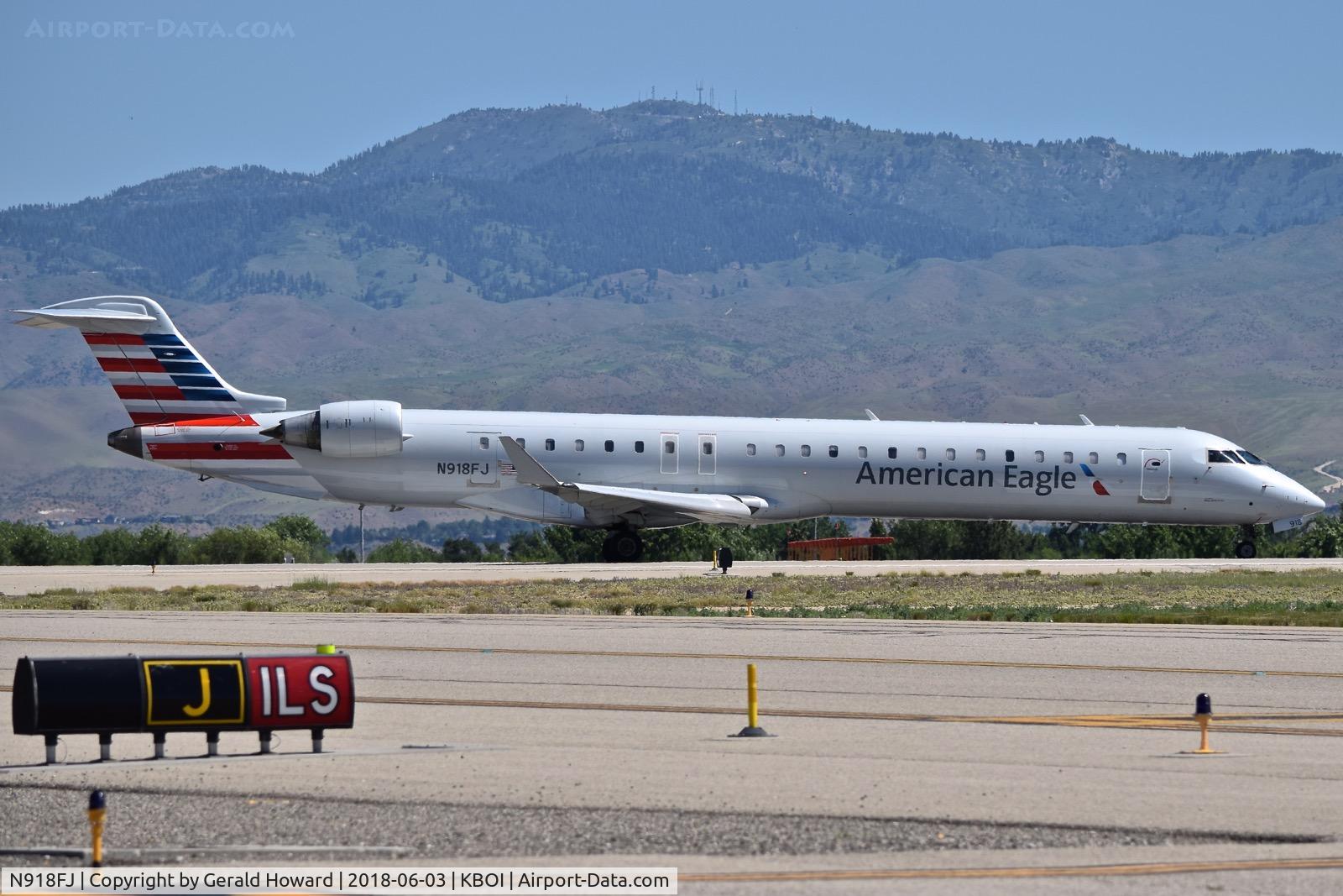 N918FJ, 2004 Bombardier CRJ-900ER (CL-600-2D24) C/N 15018, Starting take off run on RWY 10R.