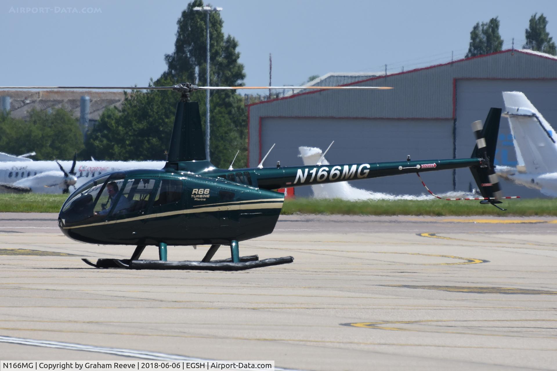 N166MG, 2016 Robinson R66 C/N 0694, Parked at Norwich.