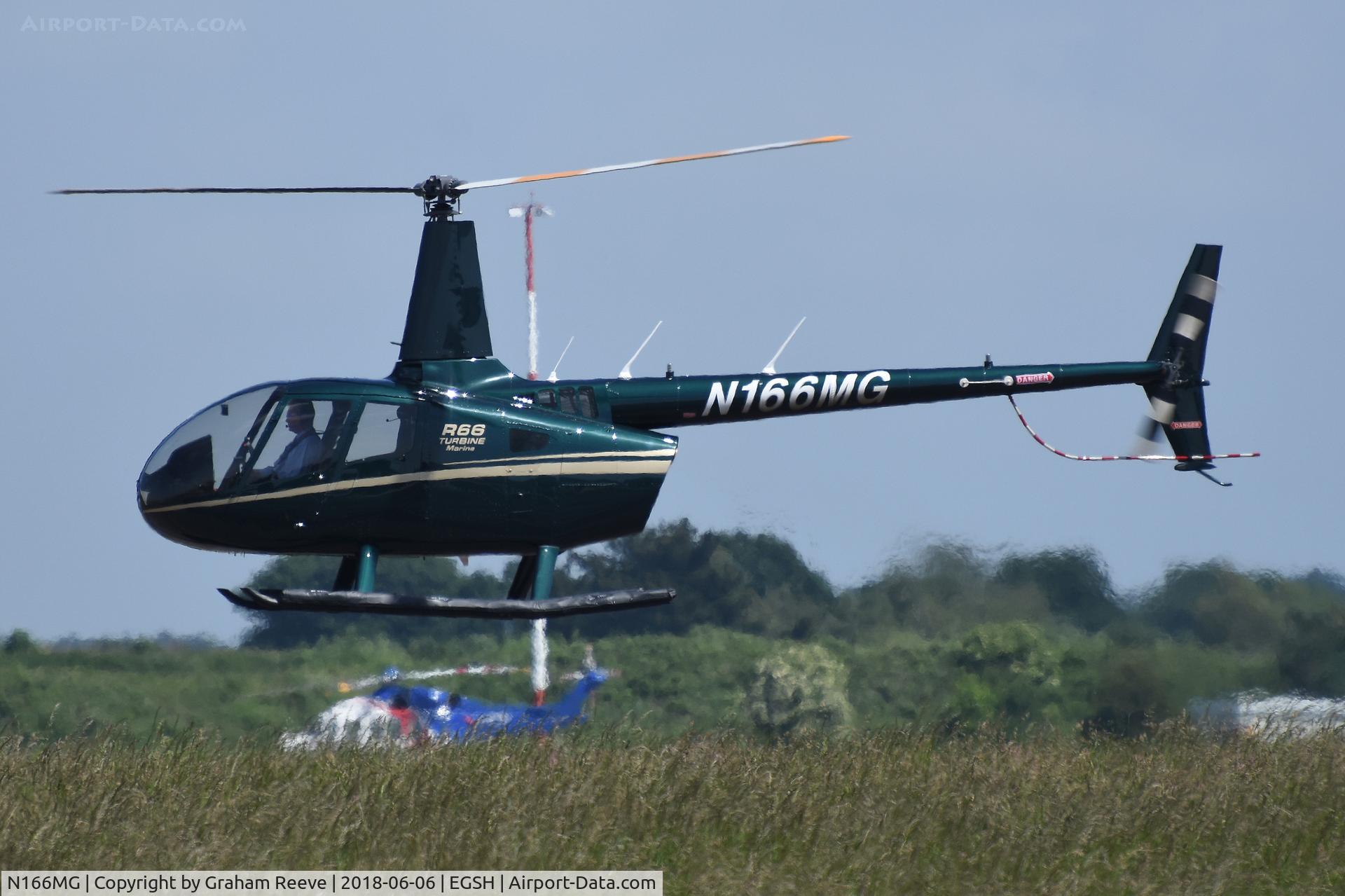 N166MG, 2016 Robinson R66 C/N 0694, Departing from Norwich.