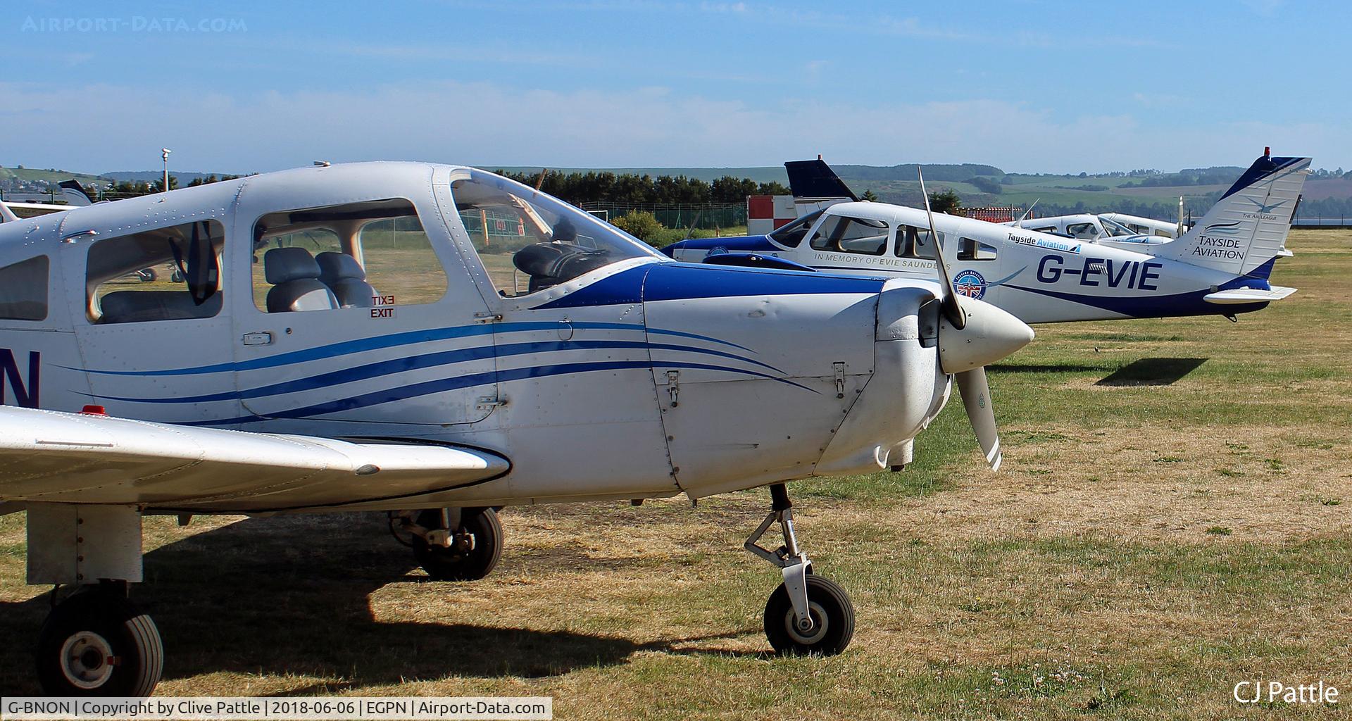 G-BNON, 1987 Piper PA-28-161 Cherokee Warrior II C/N 2816025, Close up of G-BNON with stable mates from Tayside Aviation, parked up at their base at Dundee, Scotland.