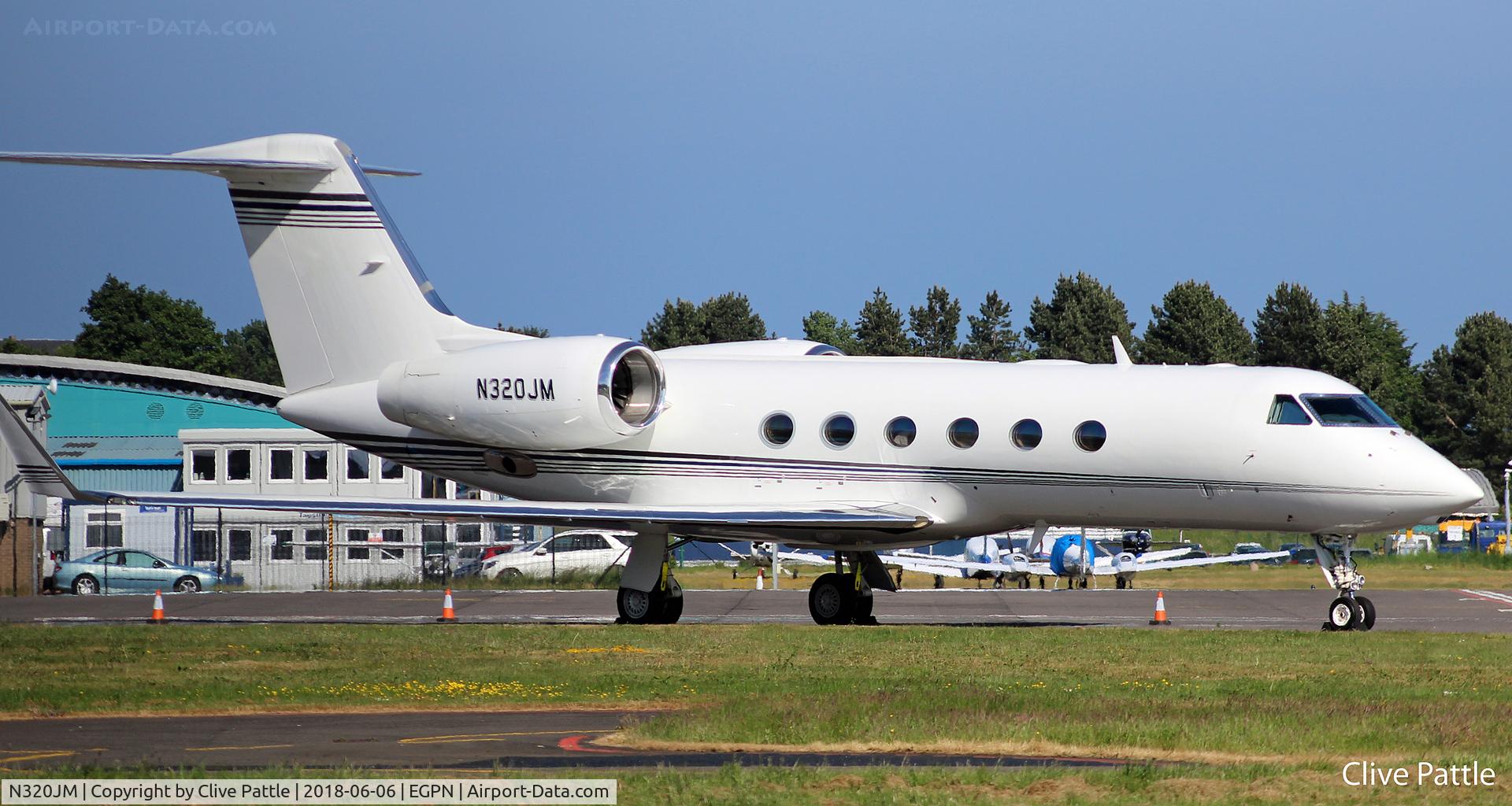 N320JM, 2005 Gulfstream Aerospace GIV-X (G450) C/N 4035, Parked on the apron at Dundee