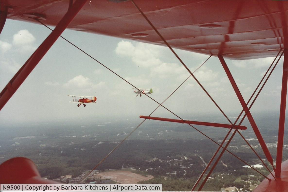 N9500, 1928 Waco ASO C/N 26, Somewhere south of Gainsville, Ga about 1982
Jack, Bryan and Darrin Austin headed back to Eufaula, Al from Gainsville, Ga Fly-In in N9400. Dr Roy Wicker in Marquat Charger.