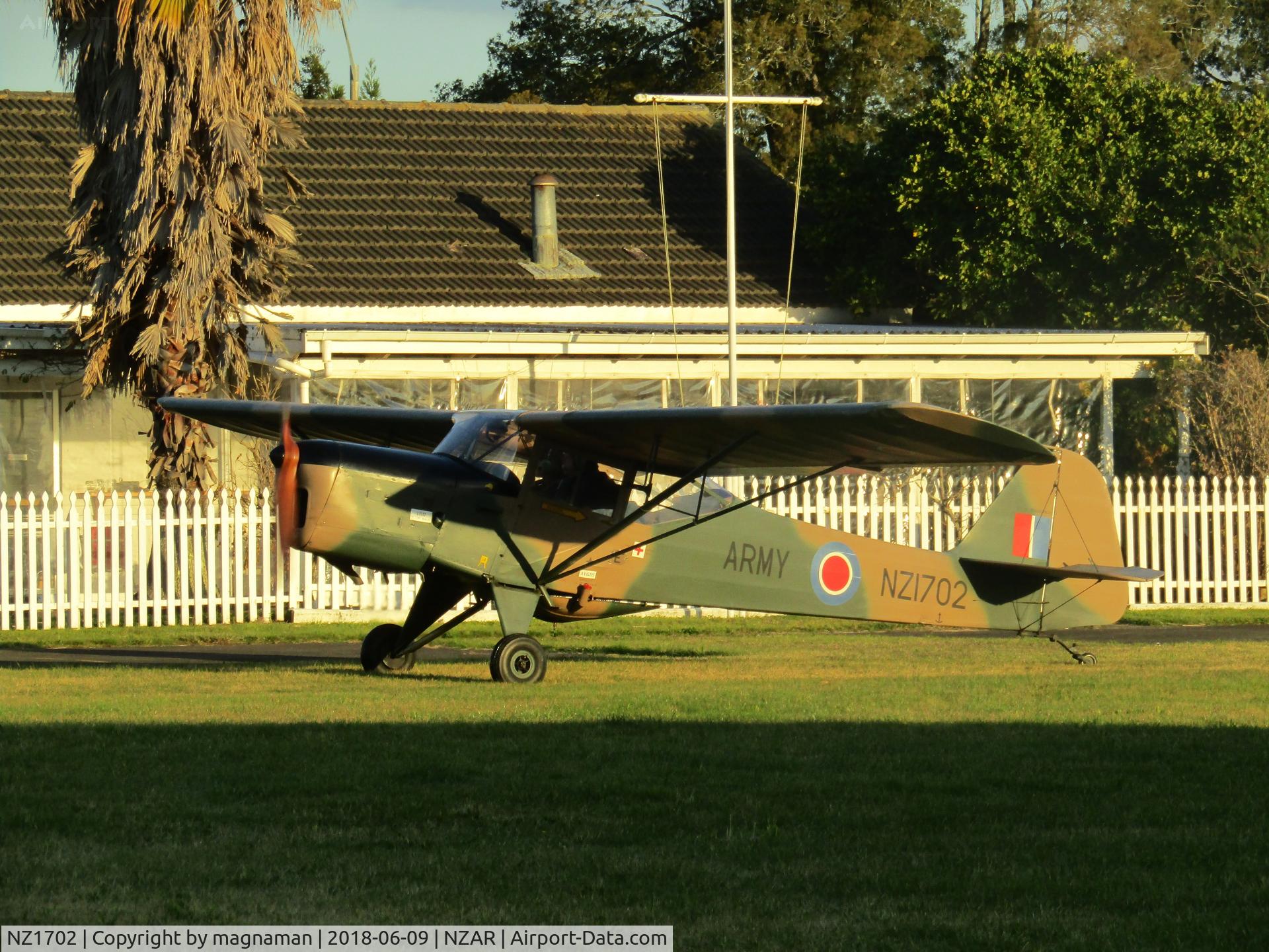 NZ1702, Auster J-5 Adventurer C/N 2096, parking up in afternoon winter sun