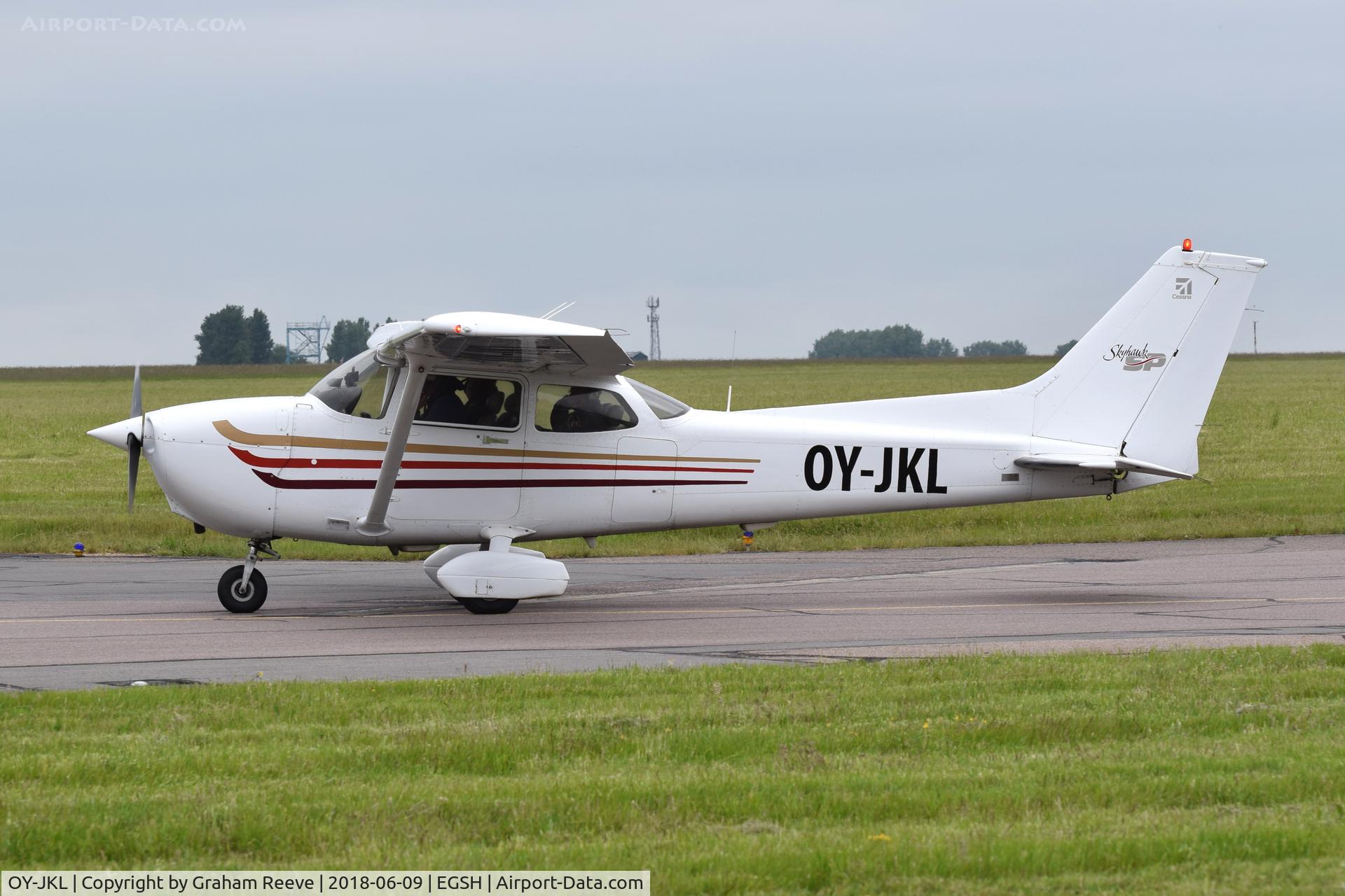 OY-JKL, 2000 Cessna 172S Skyhawk SP C/N 172S8412, Just landed at Norwich.