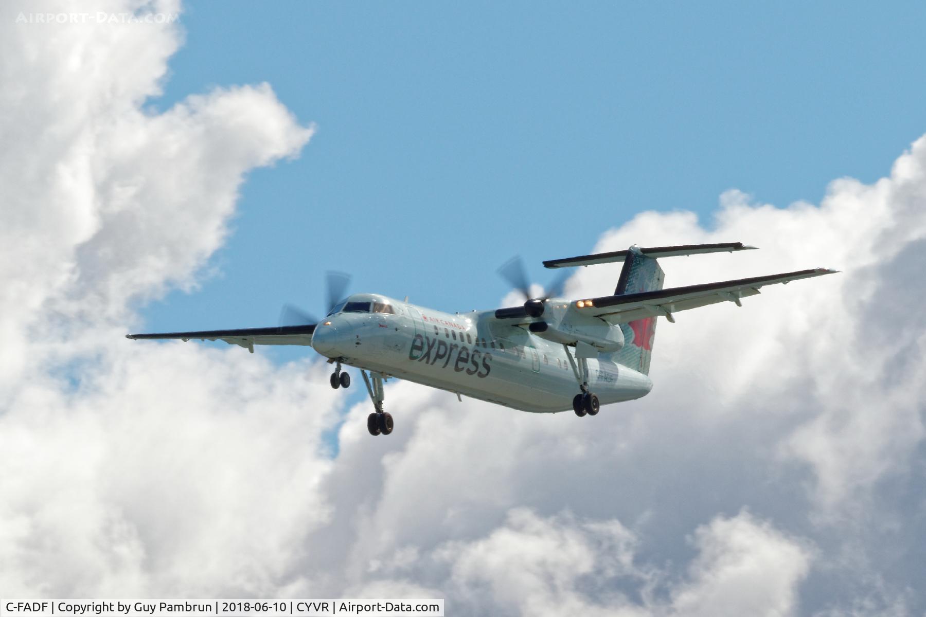 C-FADF, 1991 De Havilland Canada DHC-8-311 Dash 8 C/N 272, Landing on 26R