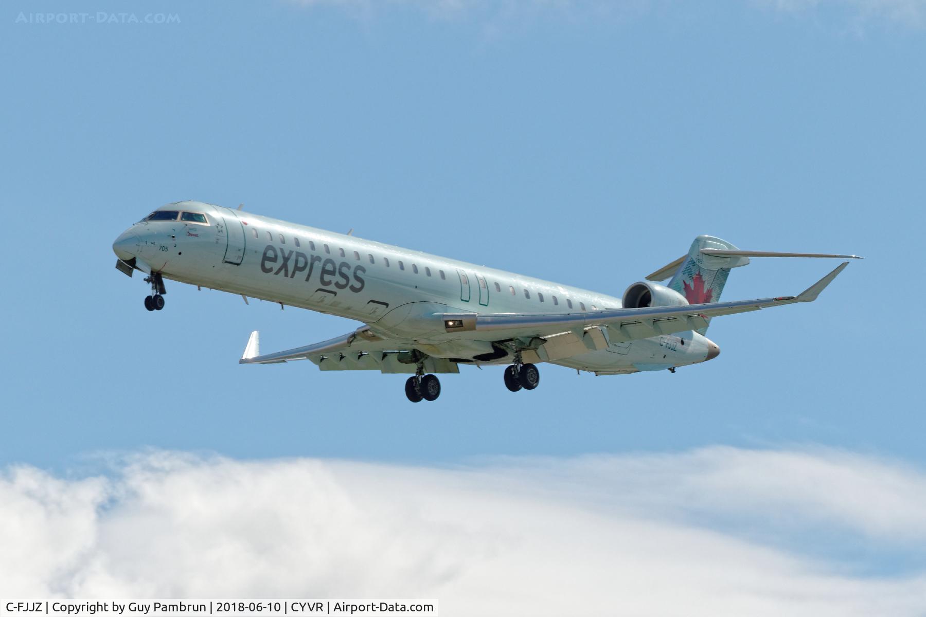 C-FJJZ, 2005 Canadair CRJ-705ER (CL-600-2D15) Regional Jet C/N 15043, Landing on 26R