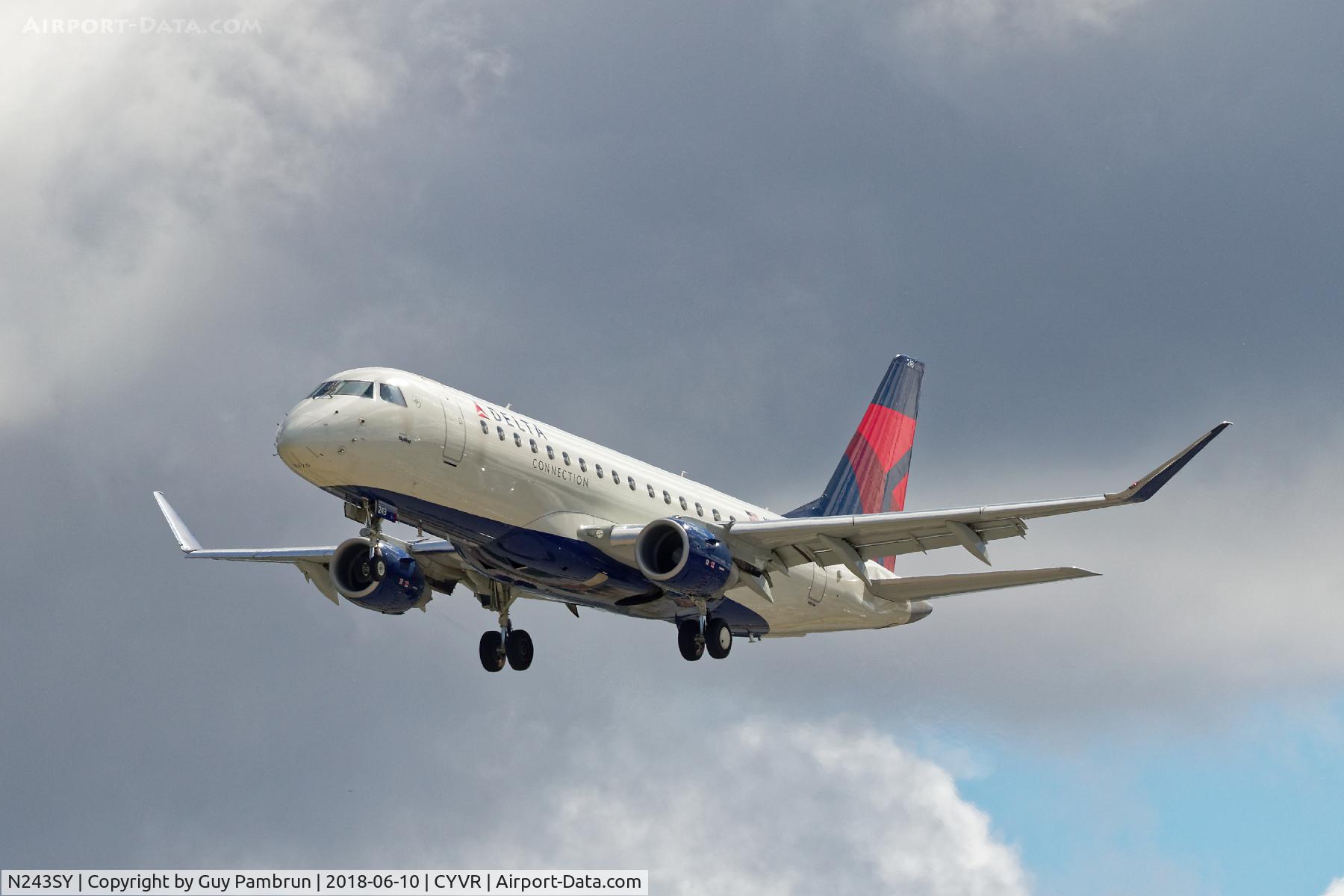 N243SY, 2016 Embraer 175LR (ERJ-170-200LR) C/N 17000592, Landing on 26R