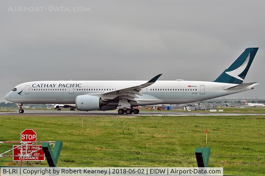 B-LRI, 2016 Airbus A350-941 C/N 058, Lining up r/w 28 for the inaugural flight to Hong Kong